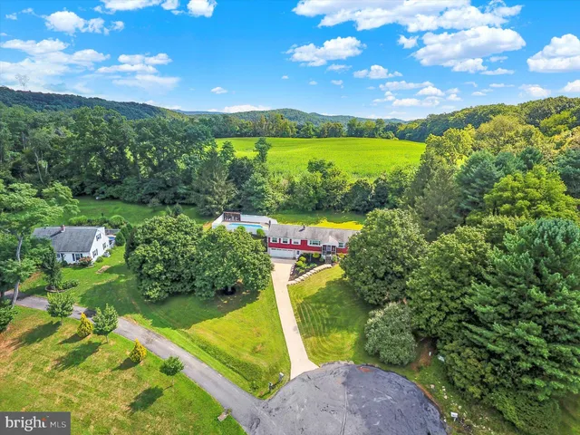 a view of a pathway with a lake view