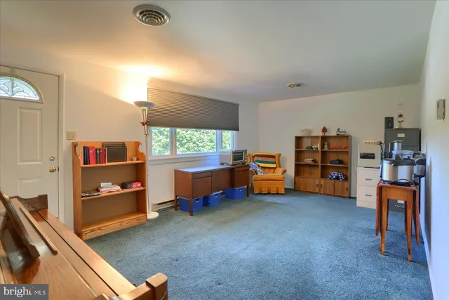 a room with furniture and window