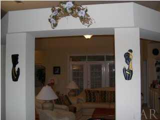 10047 Rookery Road Pensacola, FL 32507 - Photo 5 of 22 Plant ledges and archway from foyer to great room
