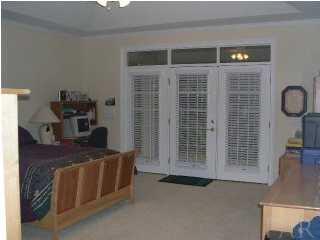 10047 Rookery Road Pensacola, FL 32507 - Photo 7 of 22 Master Bedroom French doors open to lanai