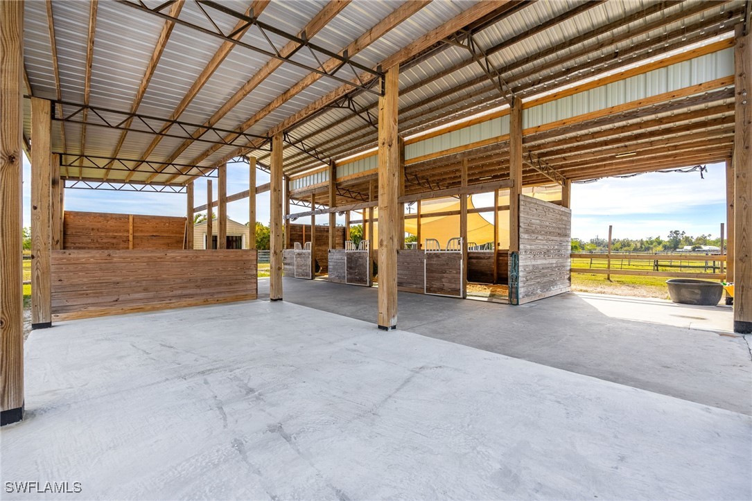 10491 Deal Road North Fort Myers, FL 33917 - Photo 35 of 48 a view of a building with a outdoor space