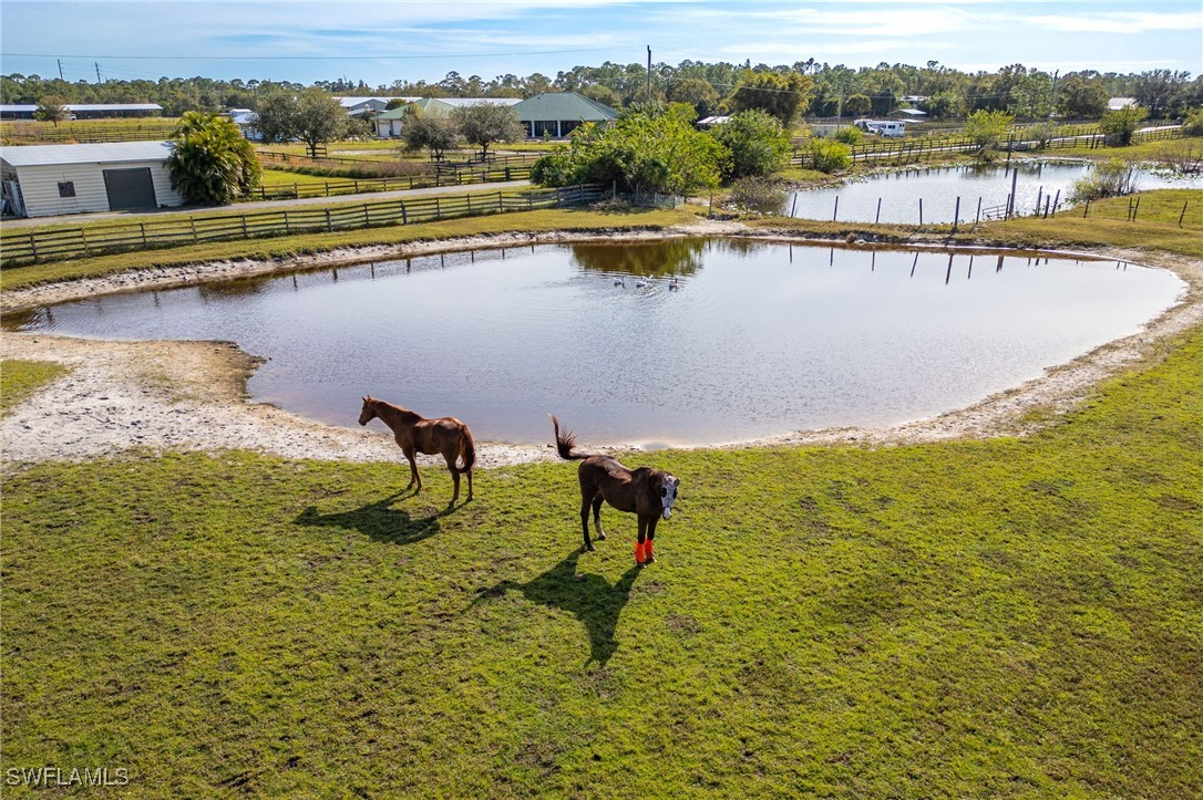 10491 Deal Road North Fort Myers, FL 33917 - Photo 5 of 48 a view of a lake with a beach