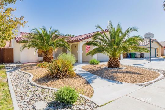642 Regency Court Ridgecrest, CA 93555 - Photo 1 of 33 a view of a yard with a fountain