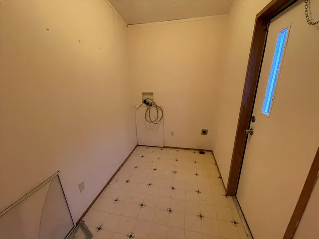 a view of a room with rack on the wall