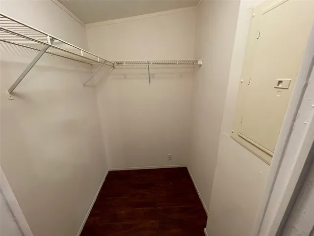 a view of a room with racks on the wall