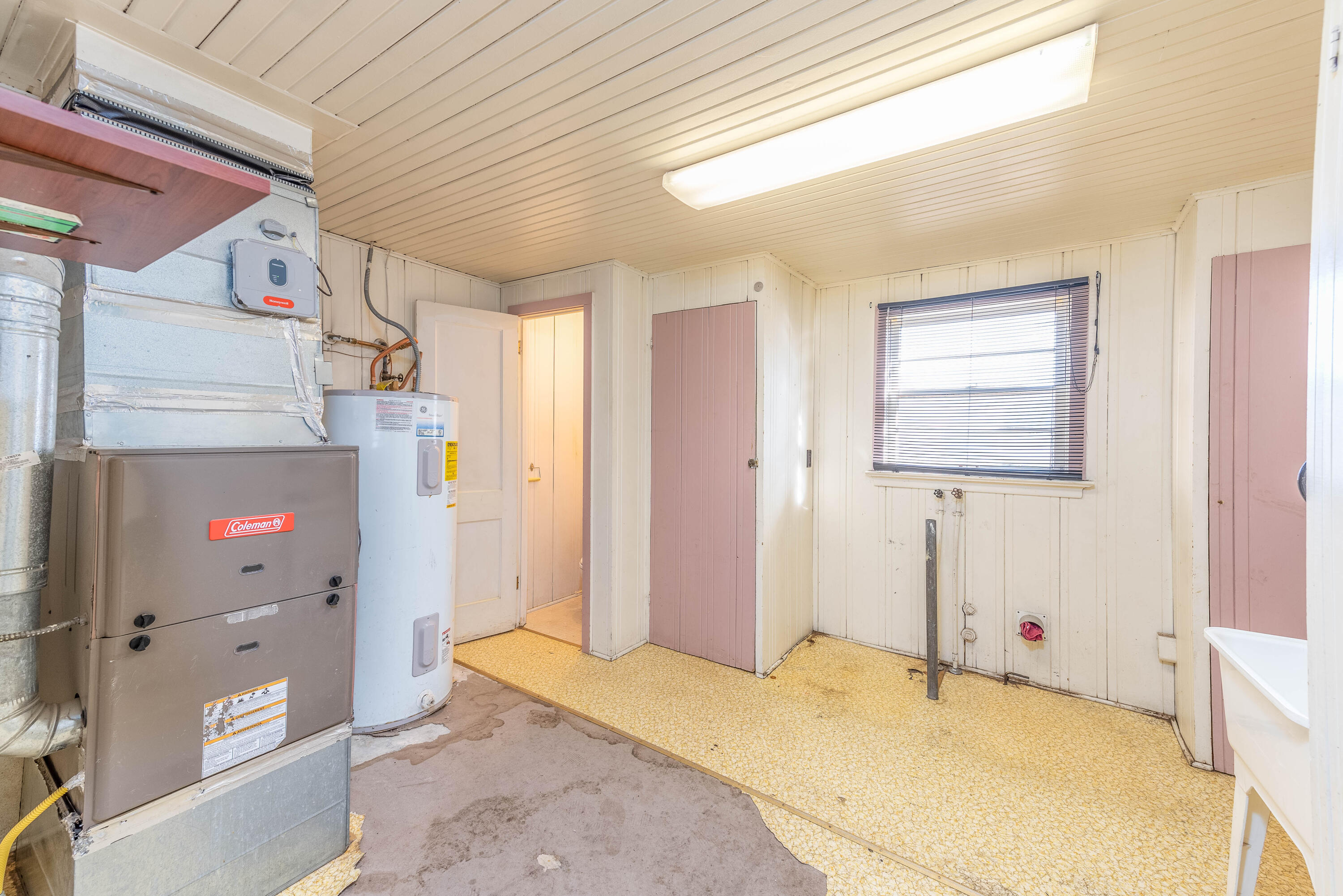 2000 Northeast 8th Street Bend, OR 97701 - Photo 12 of 25 Utility Room/half bathroom with Sink and toilet