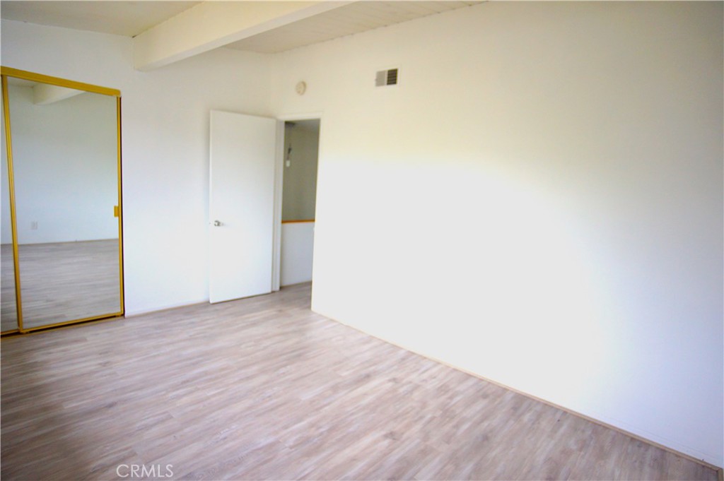 462 Seaward Road Corona del Mar, CA 92625 - Photo 11 of 25 BEDROOM 1 MIRROR CLOSET DOORS