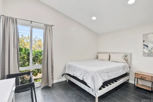 a bathroom with a sink toilet and a mirror