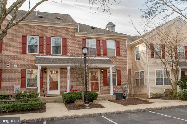 a front view of a brick building