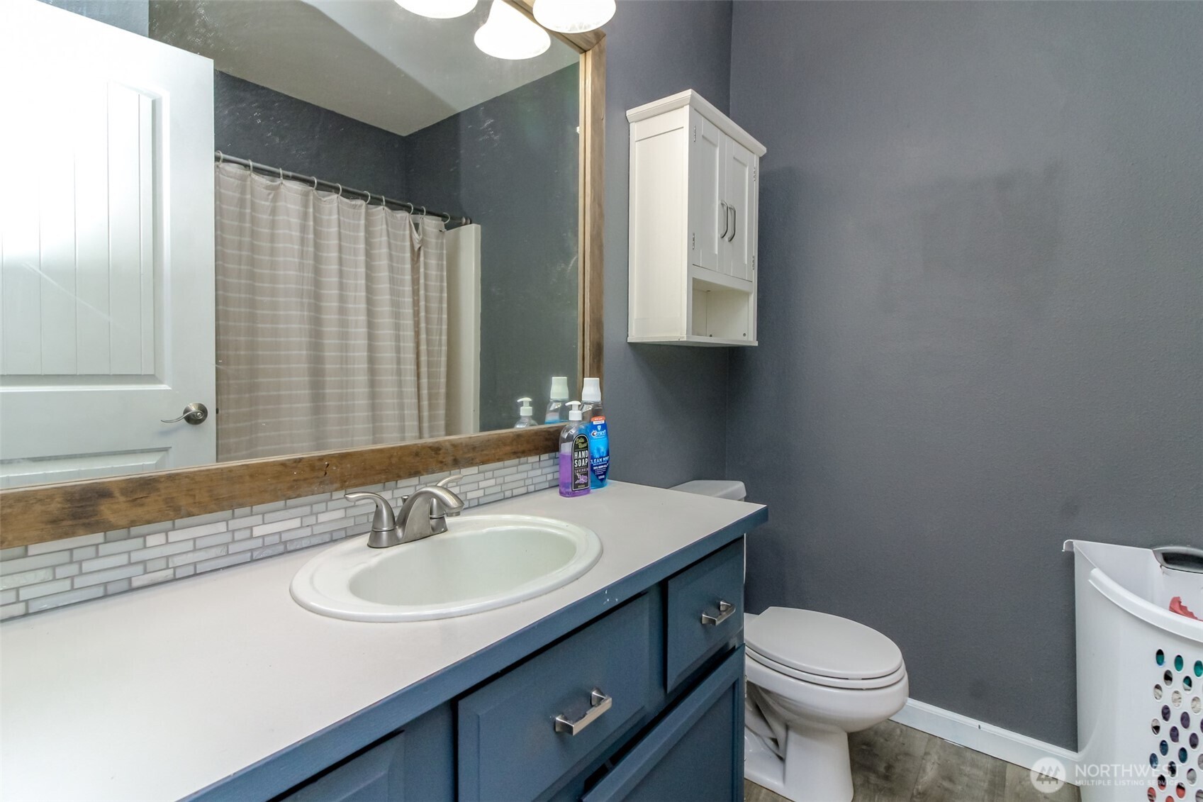 249 South Elsa Street Buckley, WA 98321 - Photo 22 of 37 a bathroom with a sink toilet and mirror