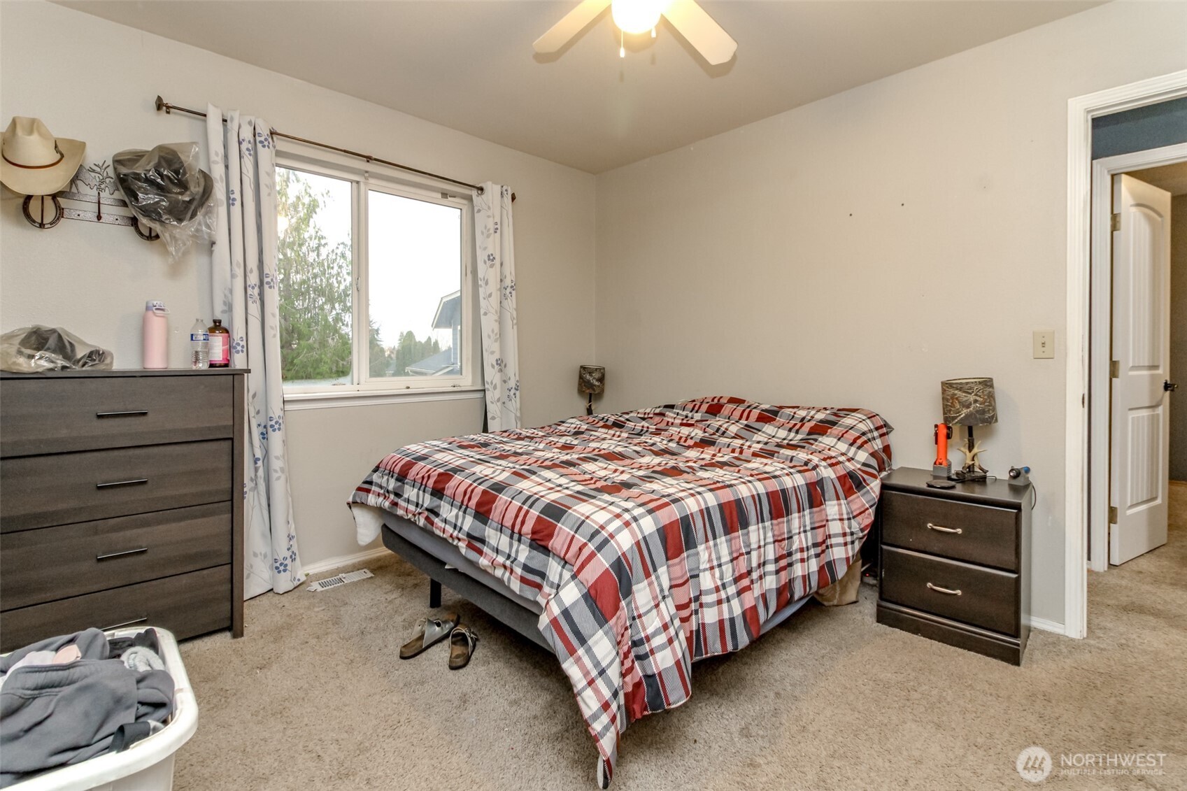 249 South Elsa Street Buckley, WA 98321 - Photo 26 of 37 a bedroom with a bed and a window