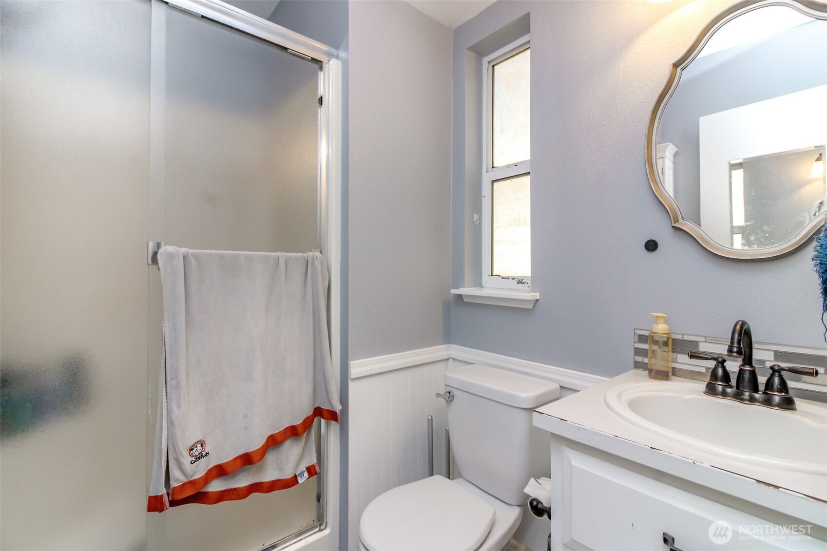 249 South Elsa Street Buckley, WA 98321 - Photo 28 of 37 a bathroom with a sink and a mirror