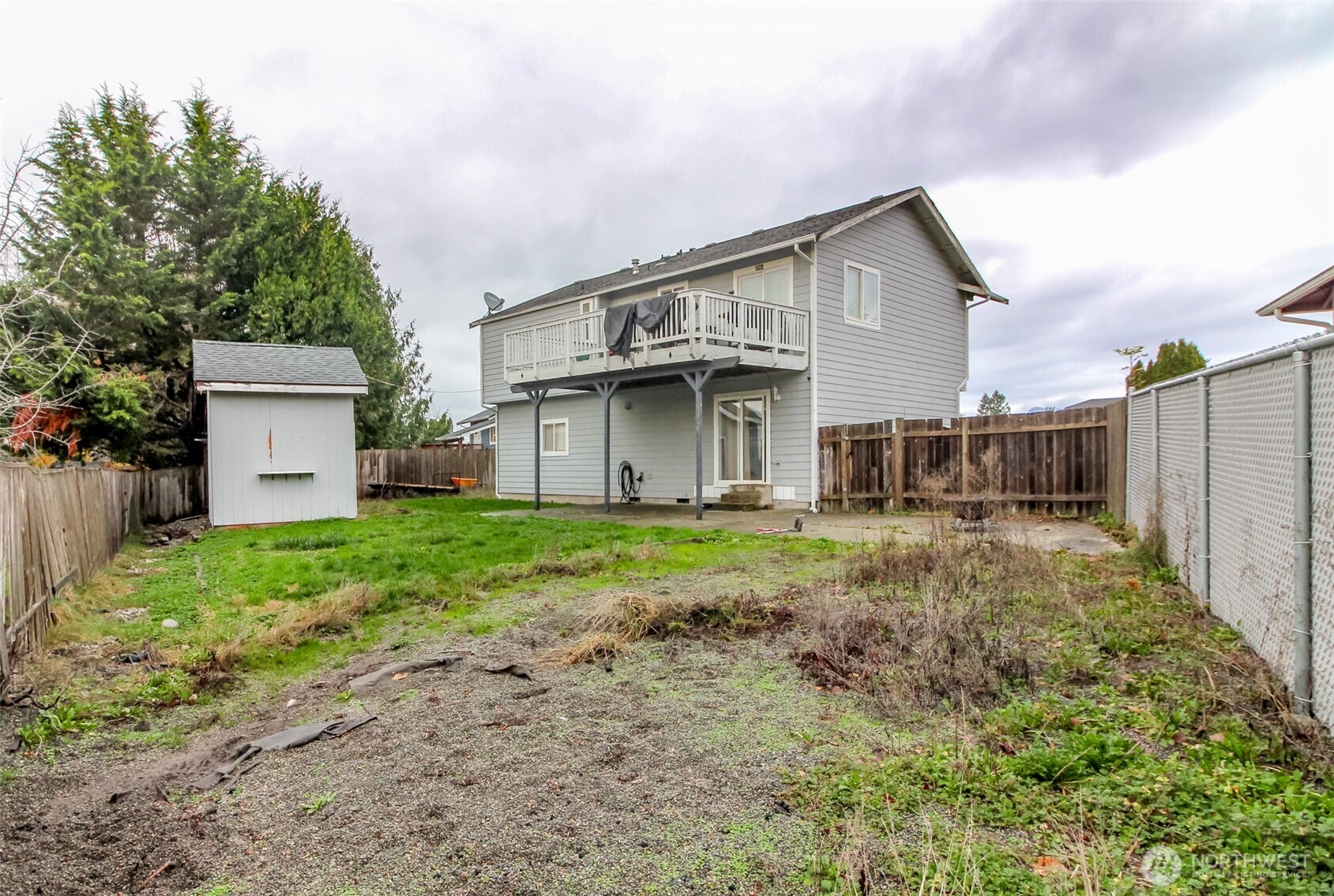 249 South Elsa Street Buckley, WA 98321 - Photo 32 of 37 a view of a house with backyard and garden