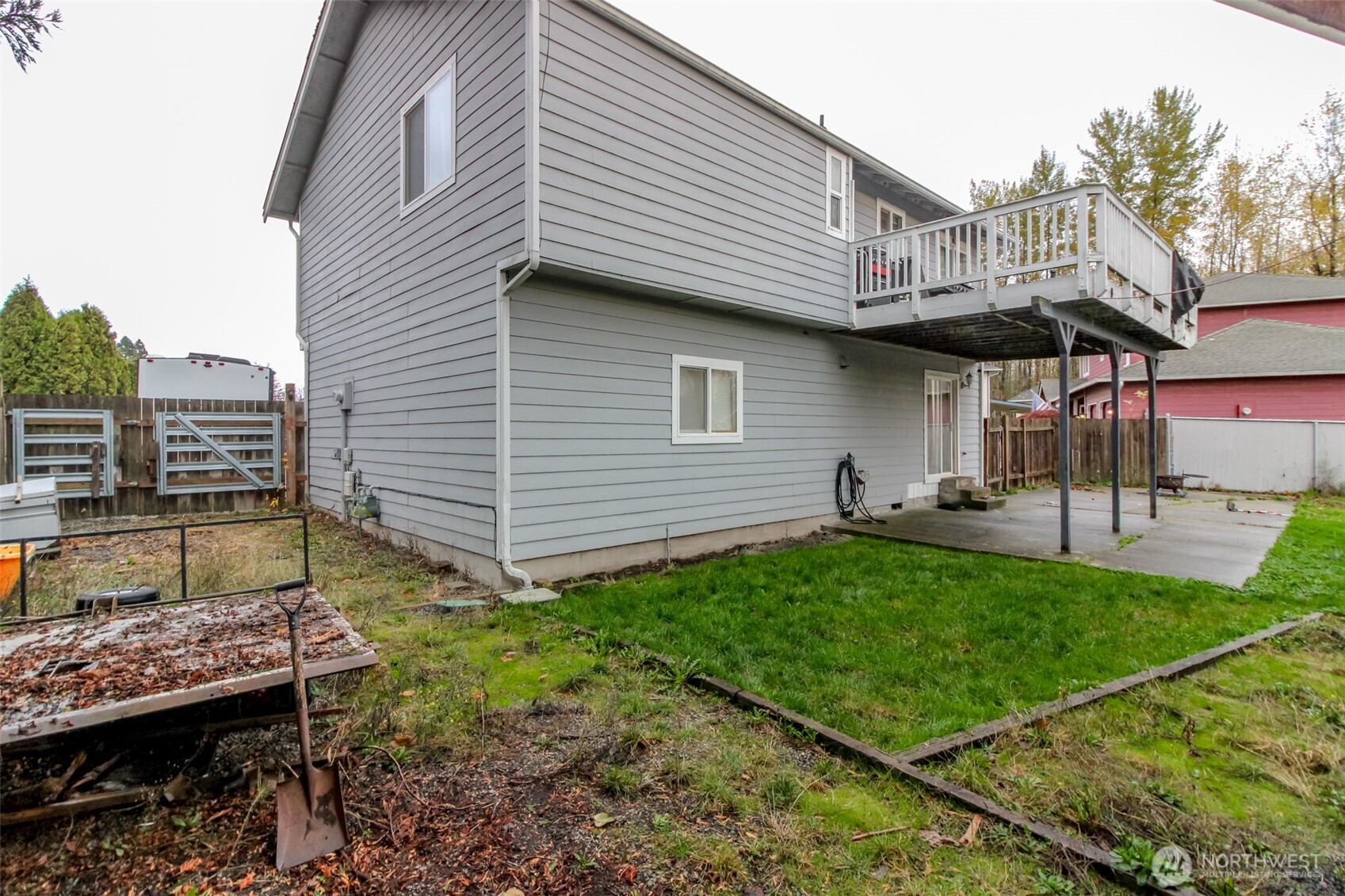 249 South Elsa Street Buckley, WA 98321 - Photo 37 of 37 a backyard of a house with barbeque oven