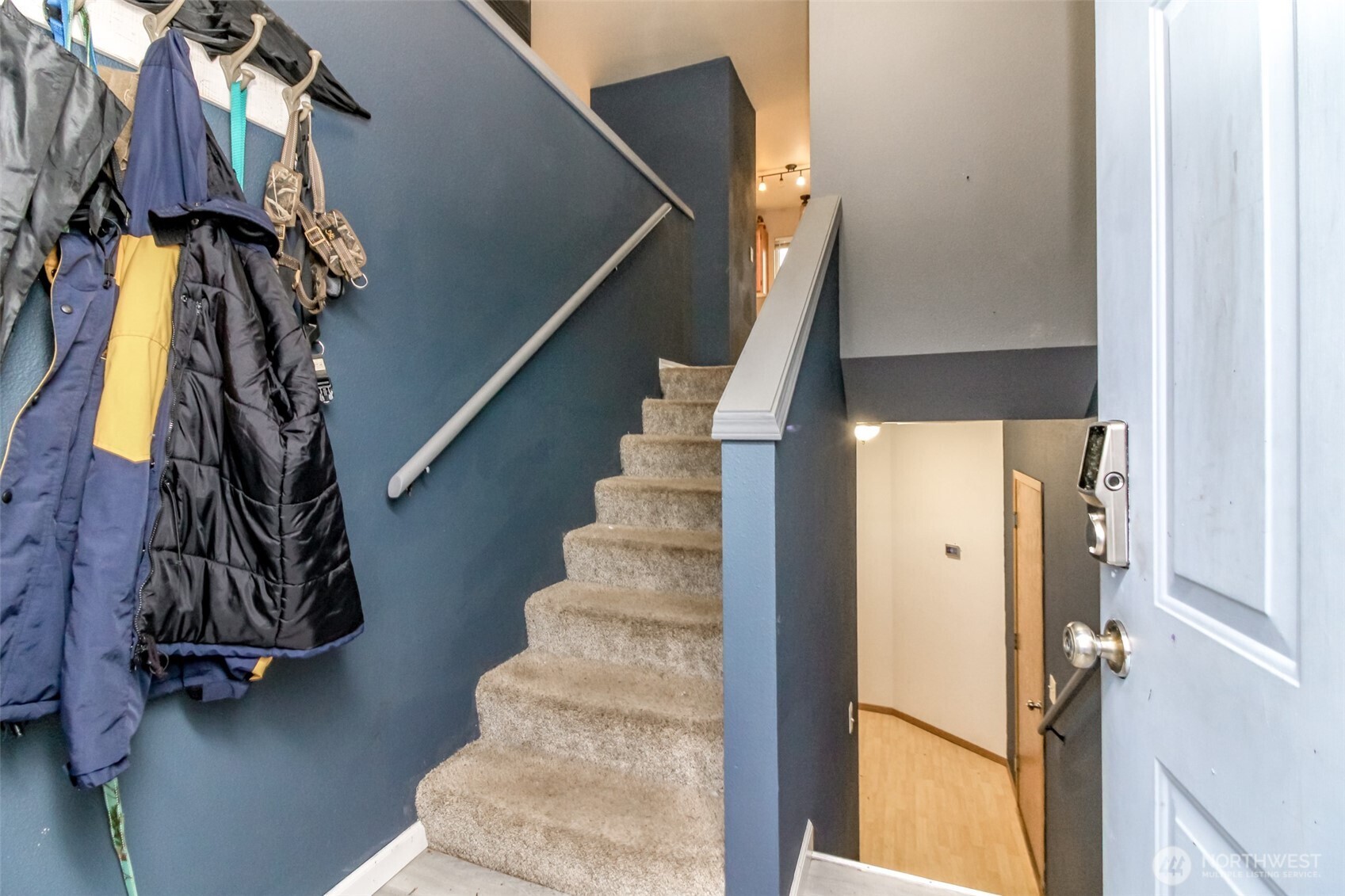 249 South Elsa Street Buckley, WA 98321 - Photo 4 of 37 a view of walk in closet with clothes and shoes