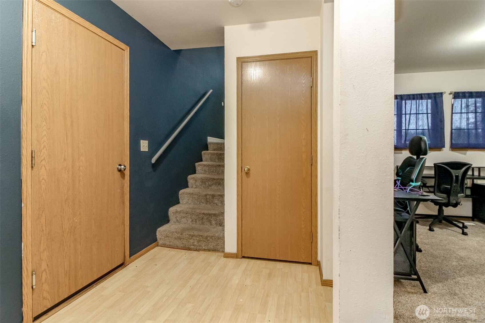 249 South Elsa Street Buckley, WA 98321 - Photo 5 of 37 a view of entryway with wooden floor and stairs