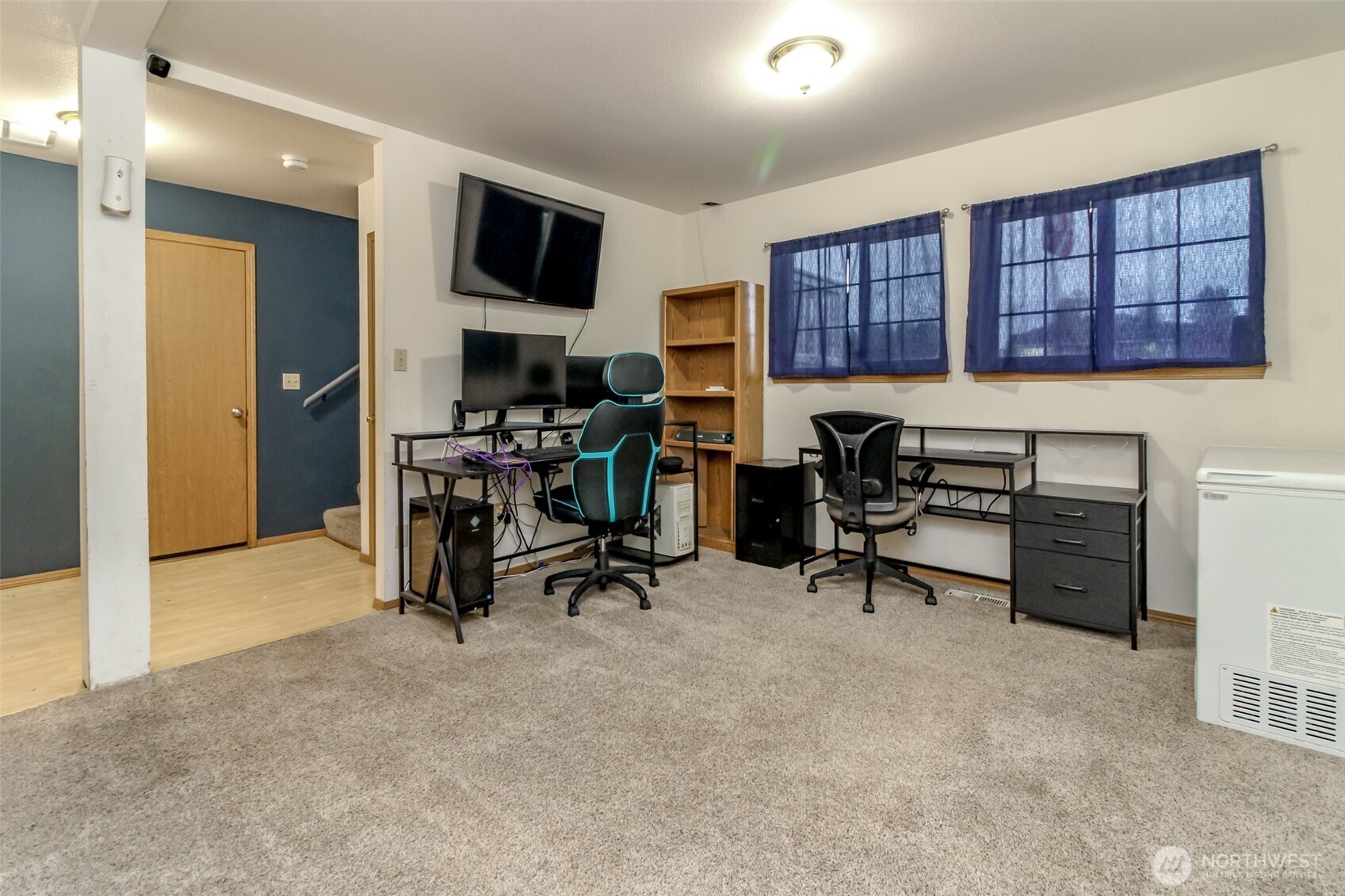 249 South Elsa Street Buckley, WA 98321 - Photo 6 of 37 a view of a livingroom with workspace and a couch