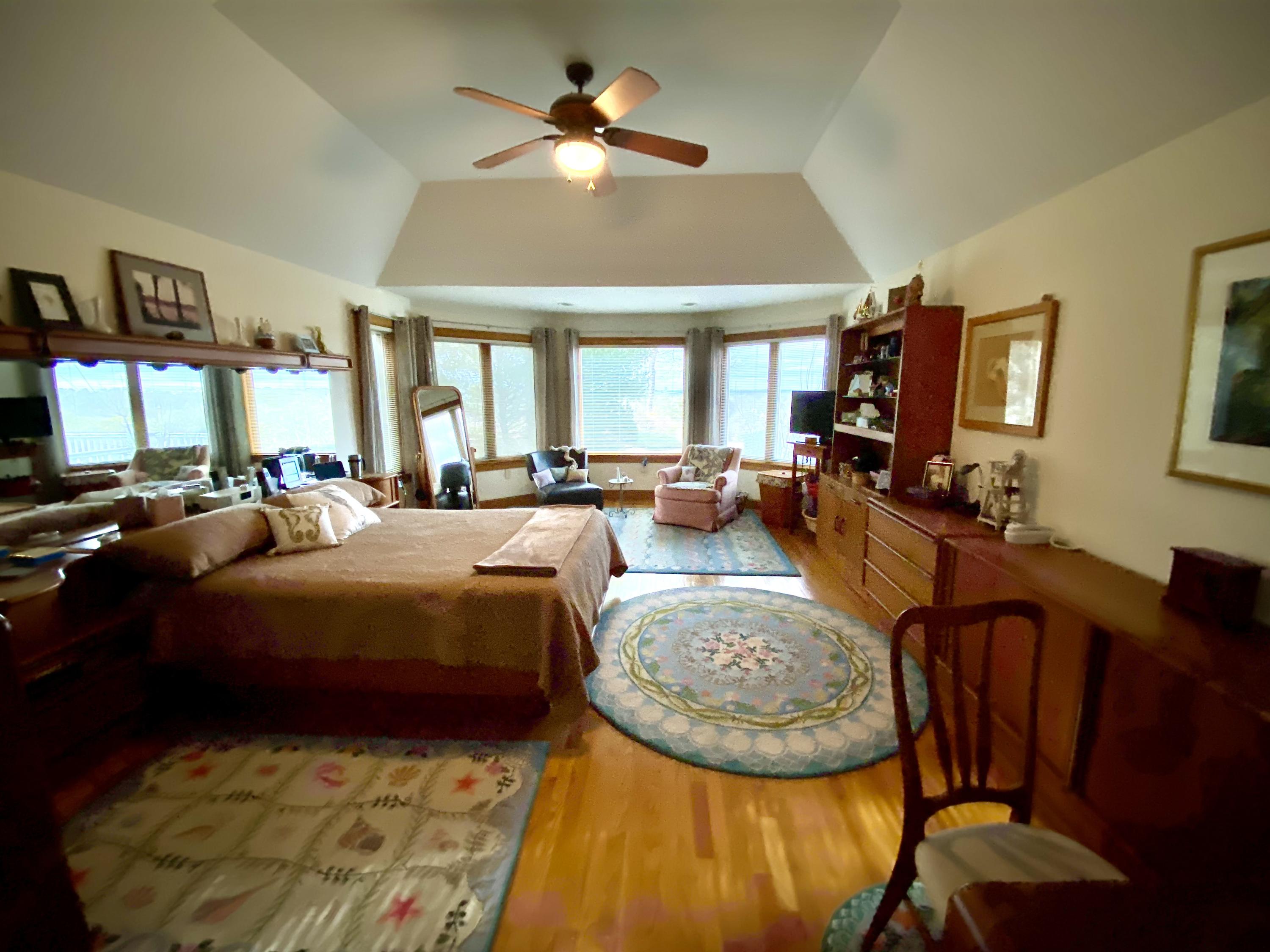 294 Cairn Ridge Road East Falmouth, MA 02536 - Photo 15 of 29 a bed room with a bed and a chair