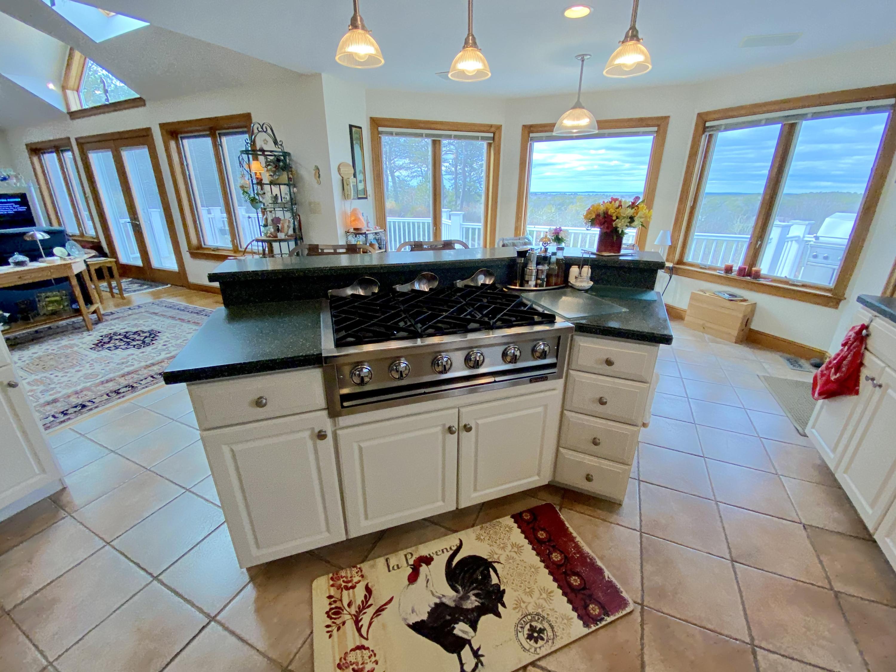 294 Cairn Ridge Road East Falmouth, MA 02536 - Photo 18 of 29 a kitchen with stainless steel appliances a stove a sink and a refrigerator