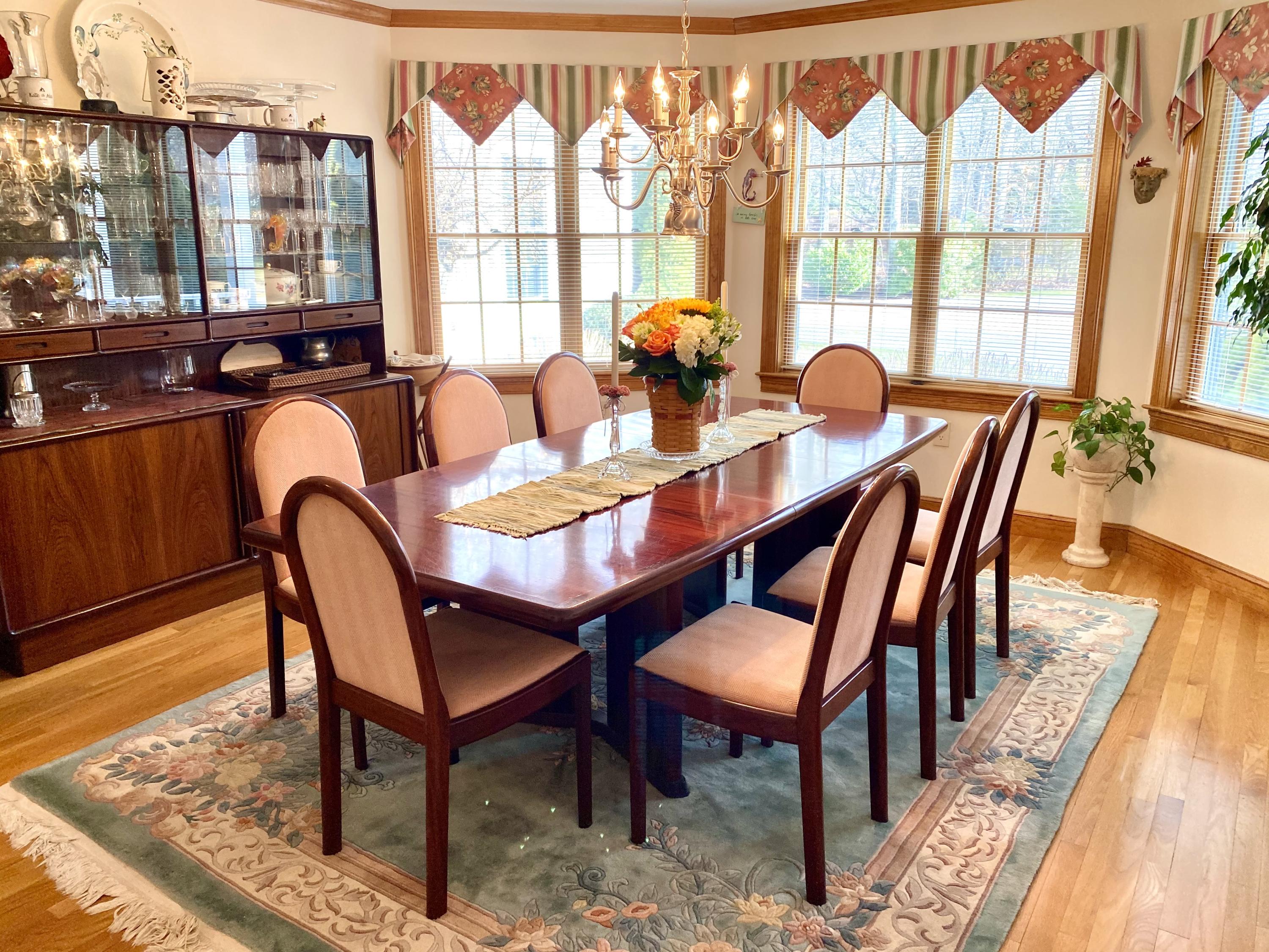 294 Cairn Ridge Road East Falmouth, MA 02536 - Photo 20 of 29 a dining room with furniture and wooden floor