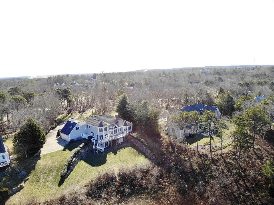 294 Cairn Ridge Road East Falmouth, MA 02536 - Photo 2 of 29 an aerial view of a house with a yard basket ball court and outdoor seating
