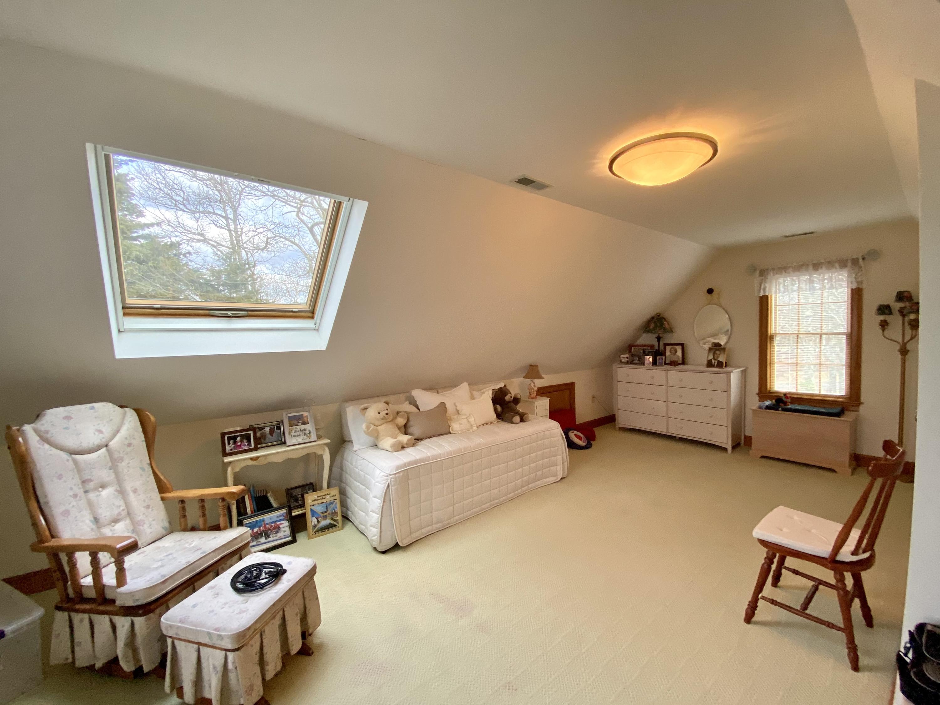 294 Cairn Ridge Road East Falmouth, MA 02536 - Photo 25 of 29 a bedroom with furniture and a large window