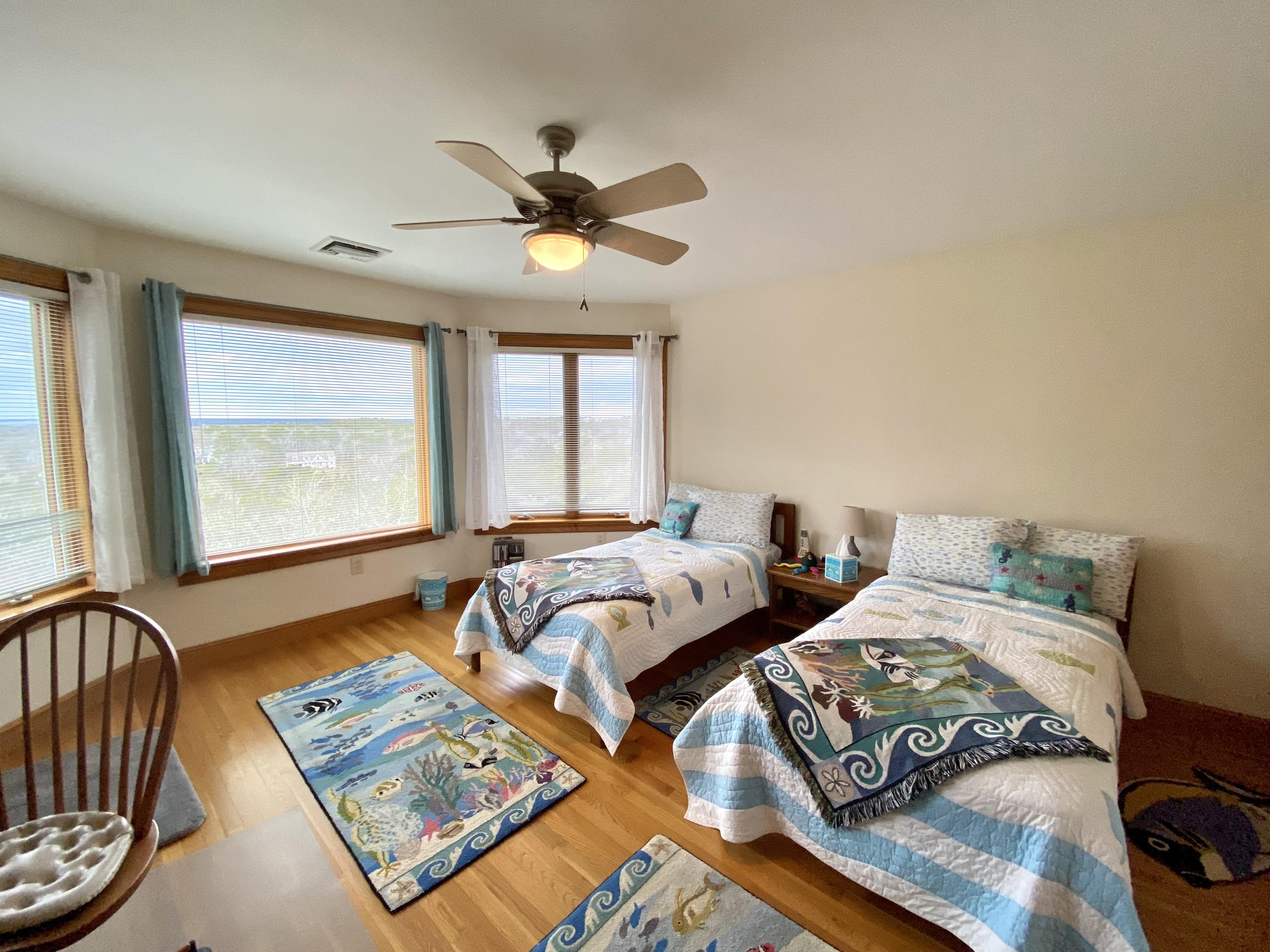 294 Cairn Ridge Road East Falmouth, MA 02536 - Photo 27 of 29 a bedroom with two beds and a window