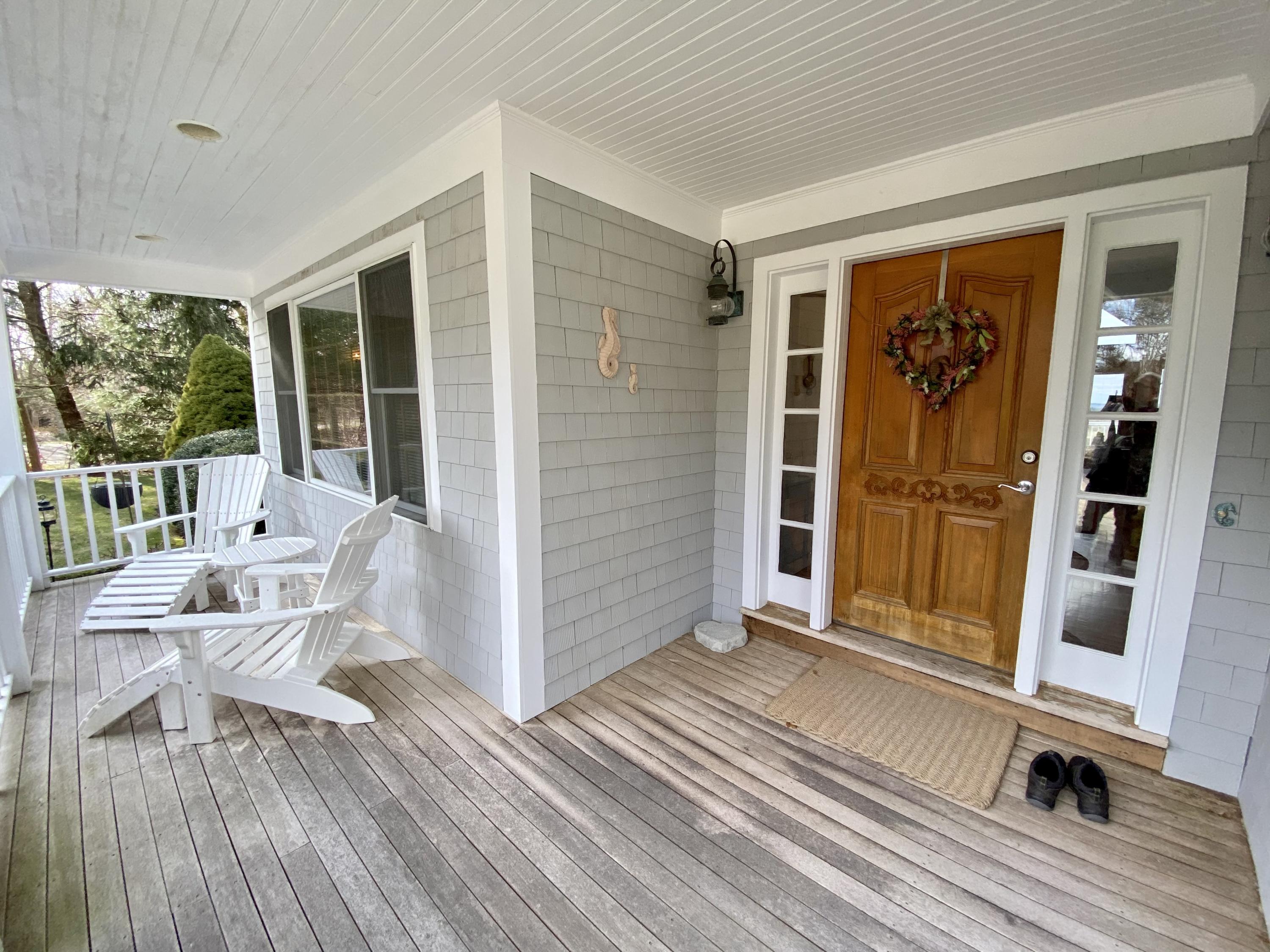 294 Cairn Ridge Road East Falmouth, MA 02536 - Photo 3 of 29 a view of a house with a porch