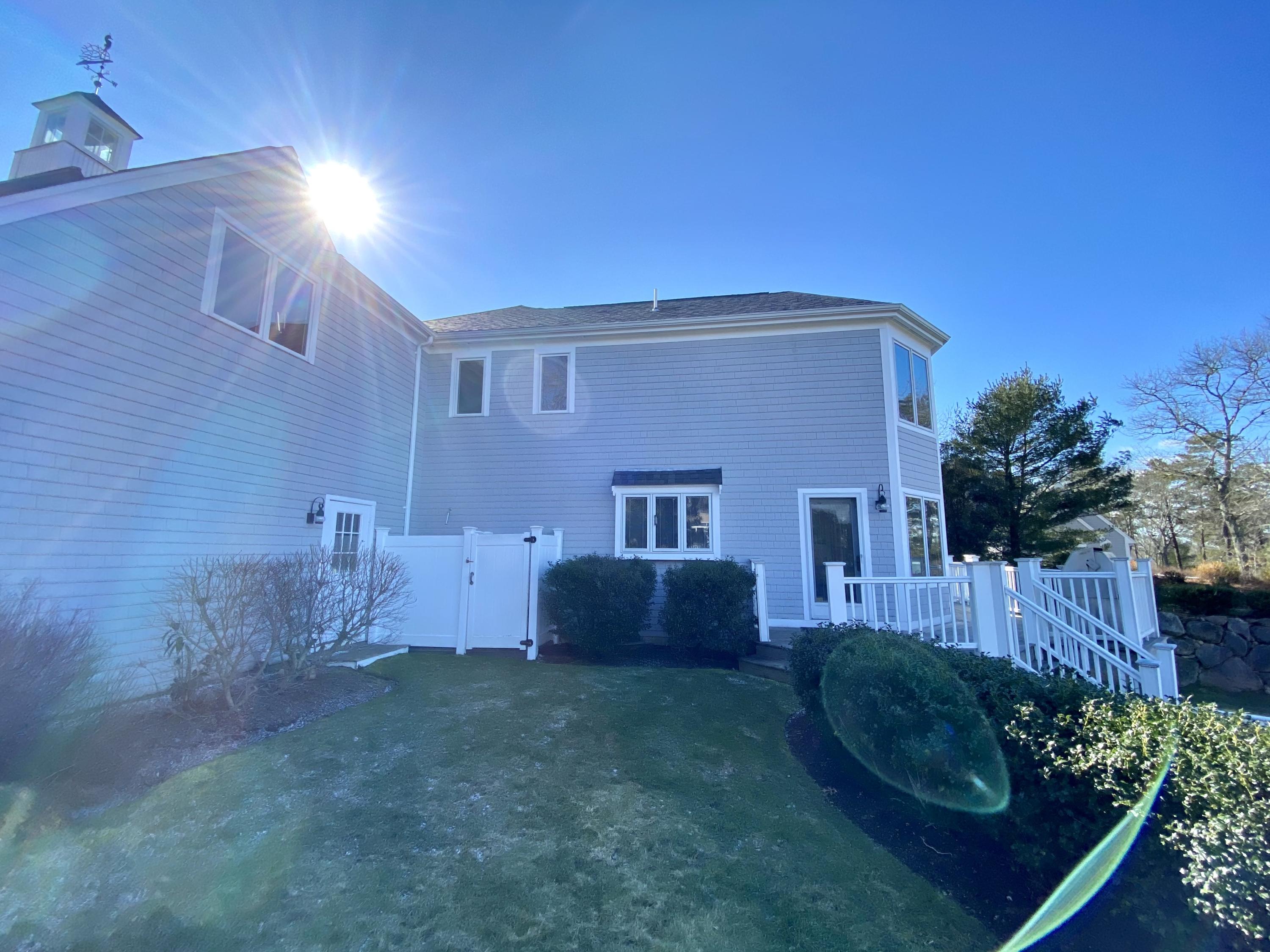 294 Cairn Ridge Road East Falmouth, MA 02536 - Photo 6 of 29 a front view of a house with garden