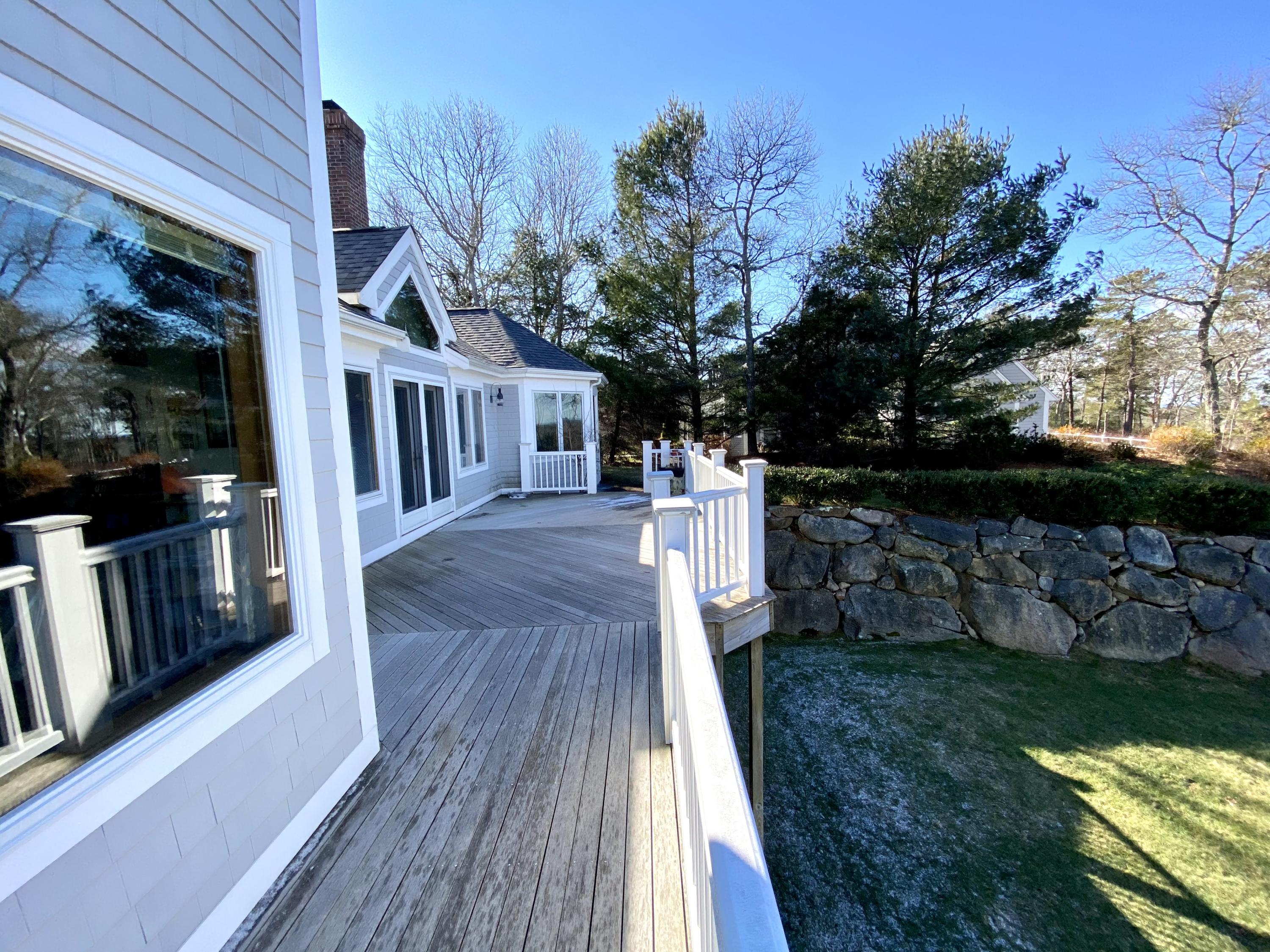 294 Cairn Ridge Road East Falmouth, MA 02536 - Photo 8 of 29 a view of backyard of the house