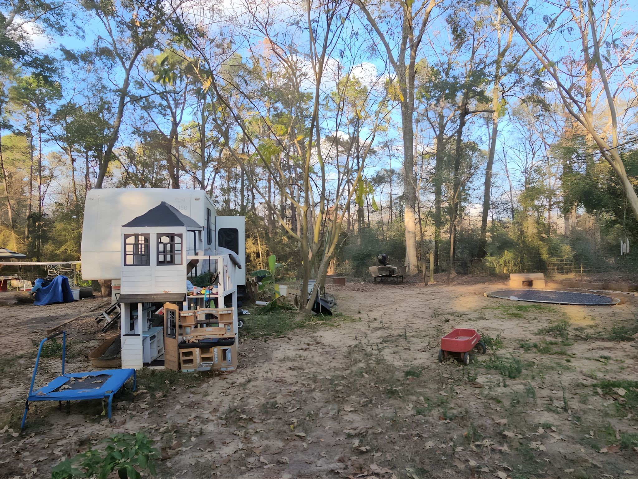 11814 Megan Road Conroe, TX 77303 - Photo 3 of 10 a view of a house with a yard and sitting area