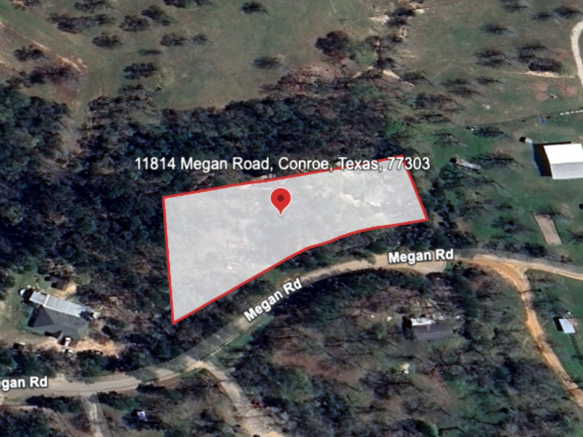 11814 Megan Road Conroe, TX 77303 - Photo 7 of 10 a view of a tree with a yard