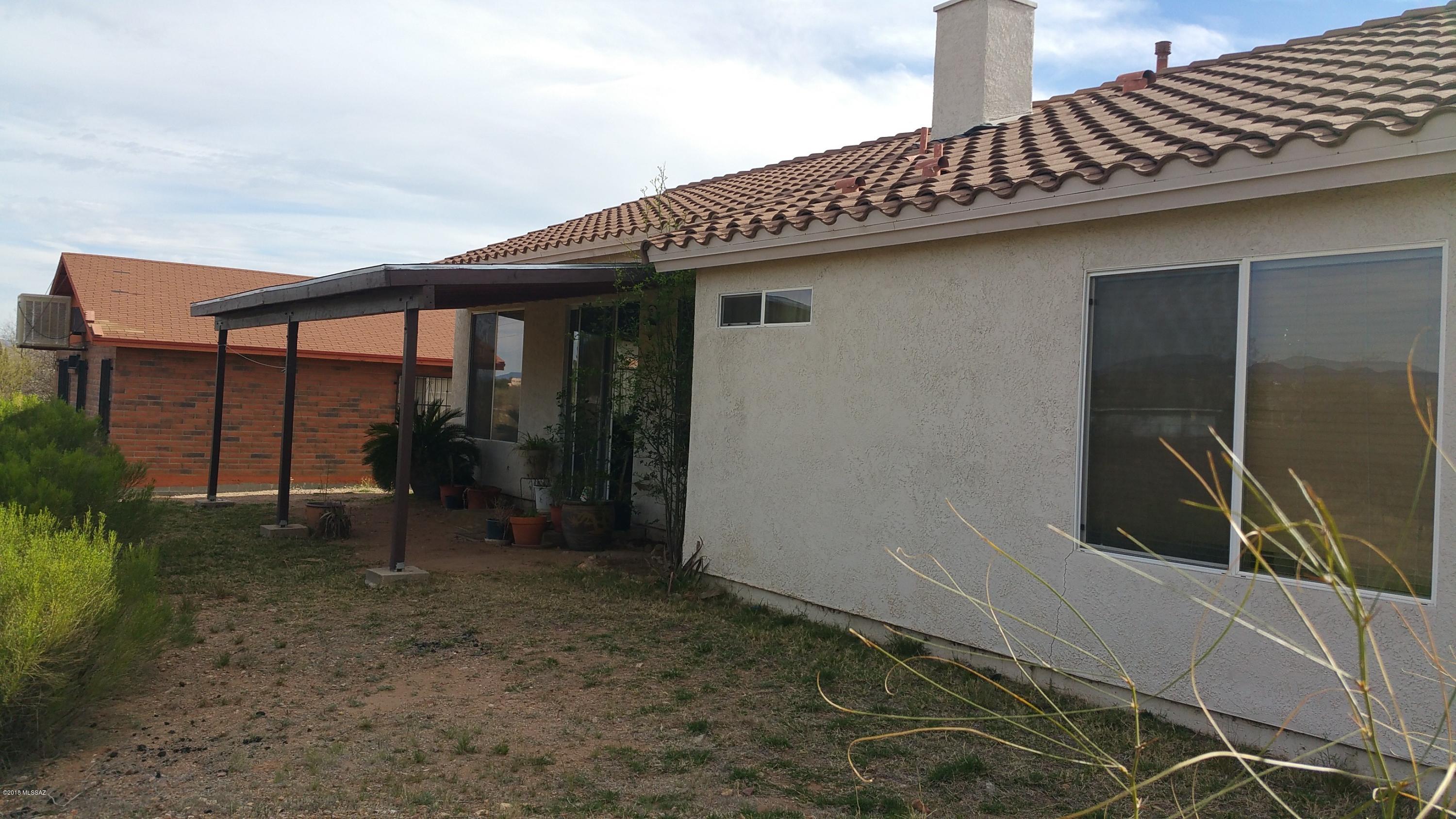 407 Willow Drive Rio Rico, AZ 85648 - Photo 9 of 15 a view of a porch