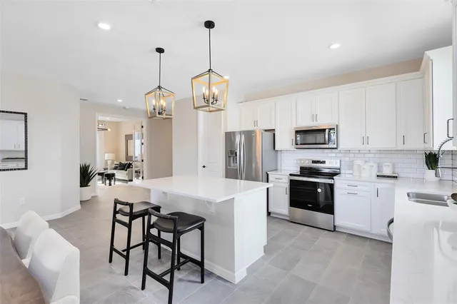 a view of kitchen and sink