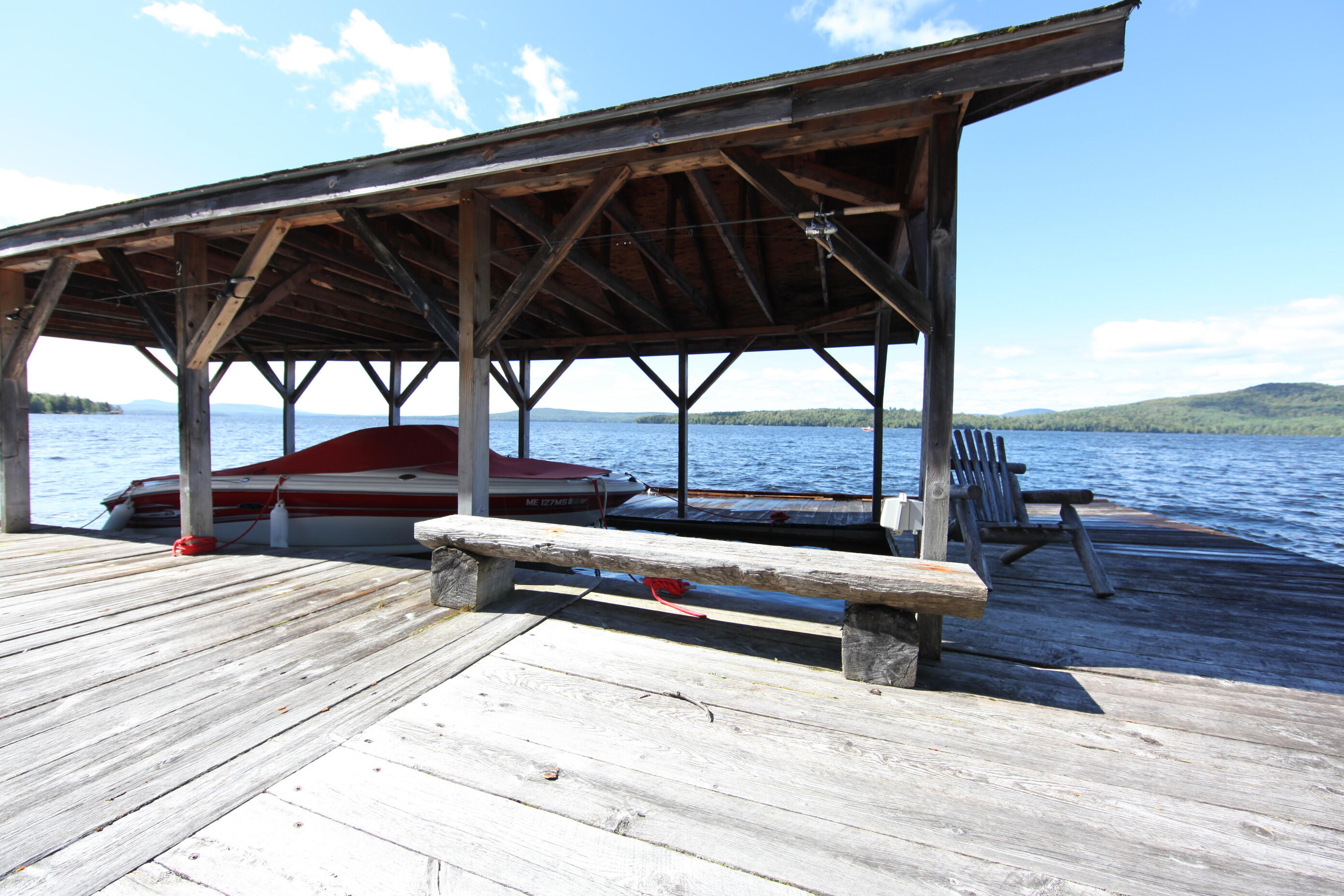 49 Bald Mountain Road Rangeley, ME 04964 - Photo 43 of 45 Dock with boat