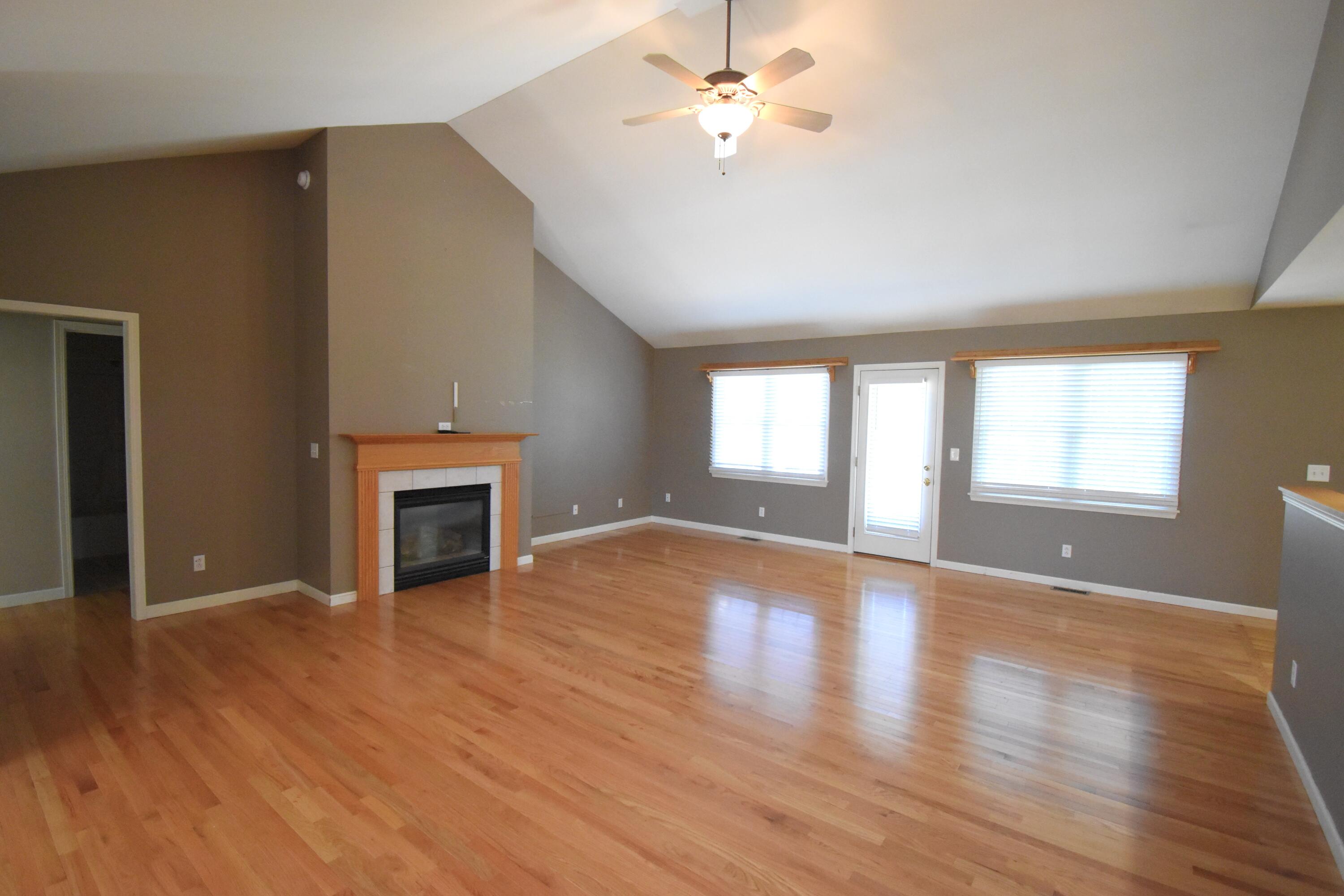 522 Pheasant Run Rensselaer, IN 47978 - Photo 15 of 55 a view of an empty room with window and wooden floor