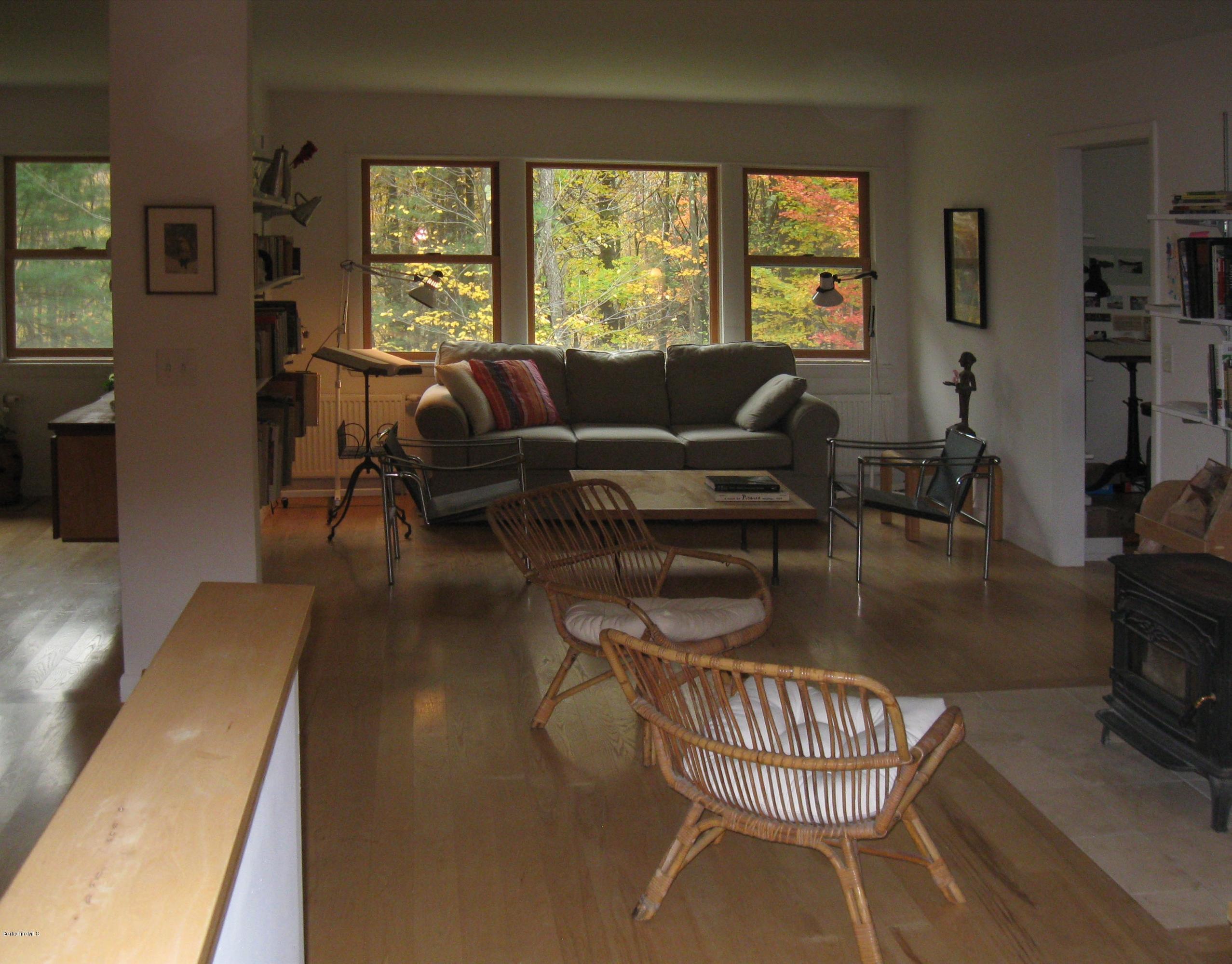 170 Leland Road Becket, MA 01223 - Photo 12 of 59 a living room with furniture and a large window