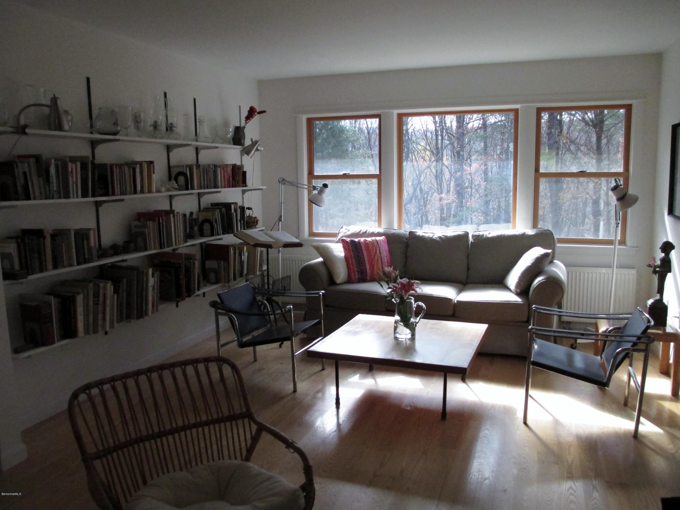 170 Leland Road Becket, MA 01223 - Photo 13 of 59 a living room with furniture window and wooden floor