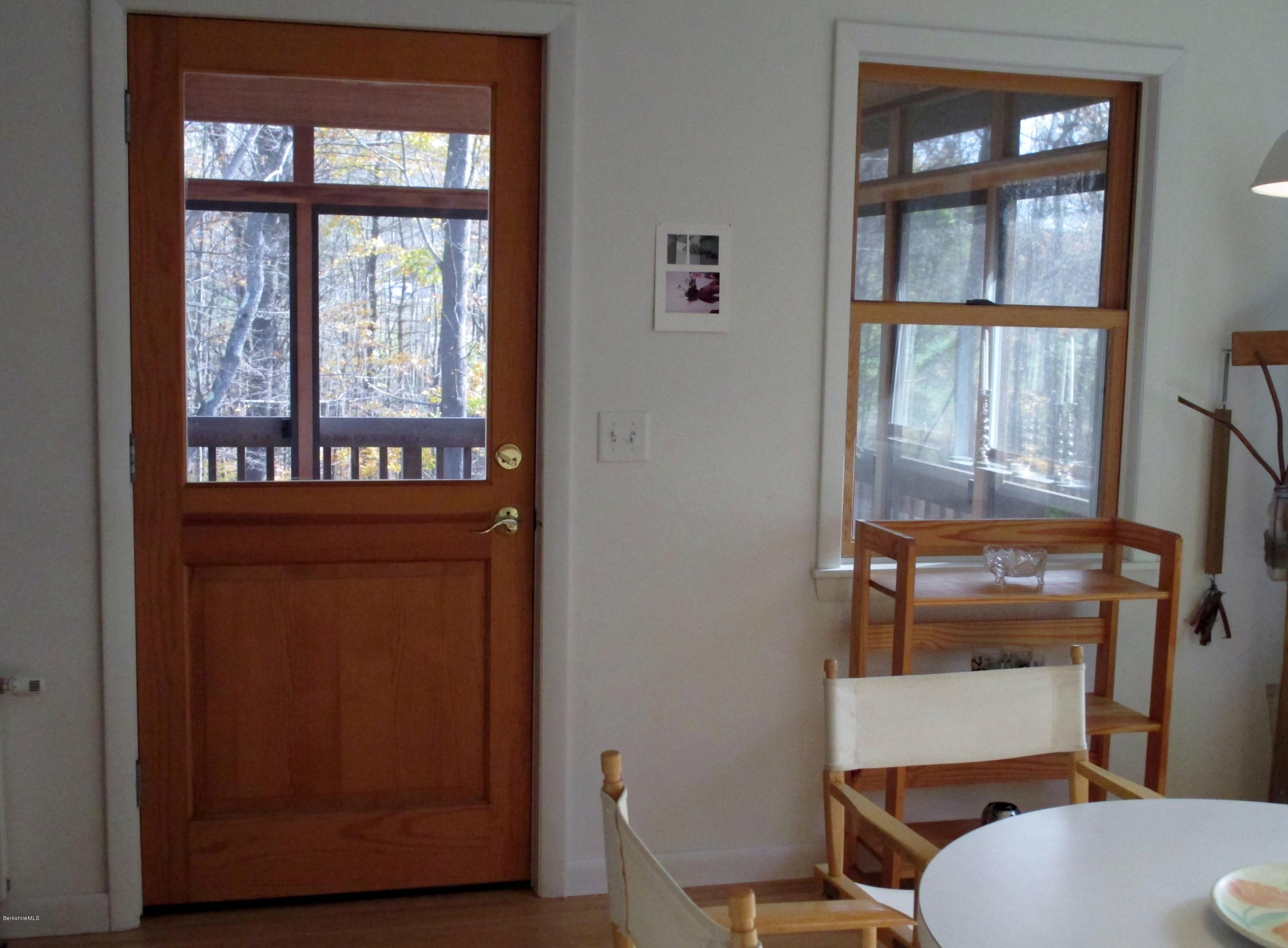 170 Leland Road Becket, MA 01223 - Photo 19 of 59 a bathroom with a toilet a sink and a window