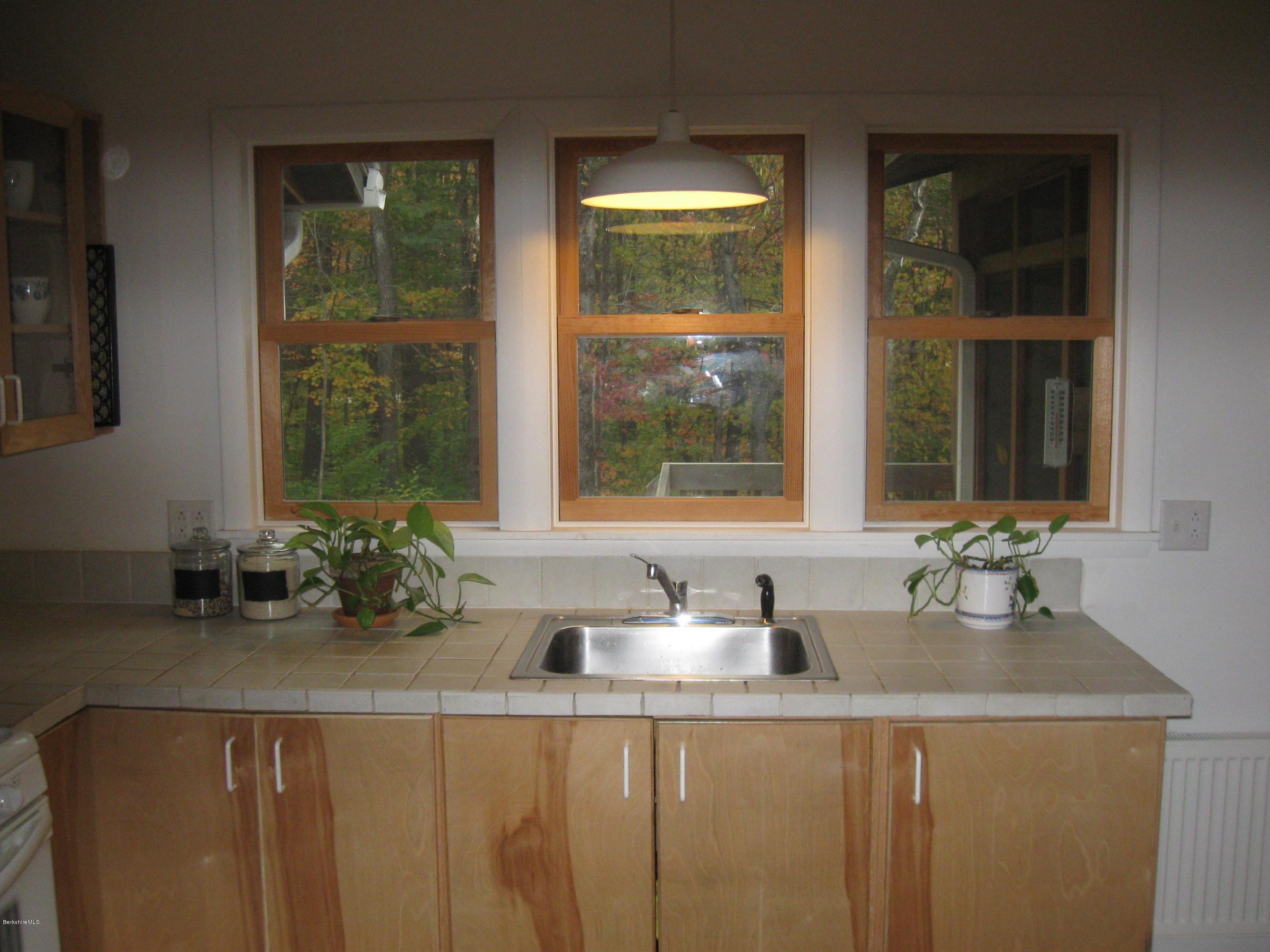 170 Leland Road Becket, MA 01223 - Photo 23 of 59 a bathroom with a sink and a window