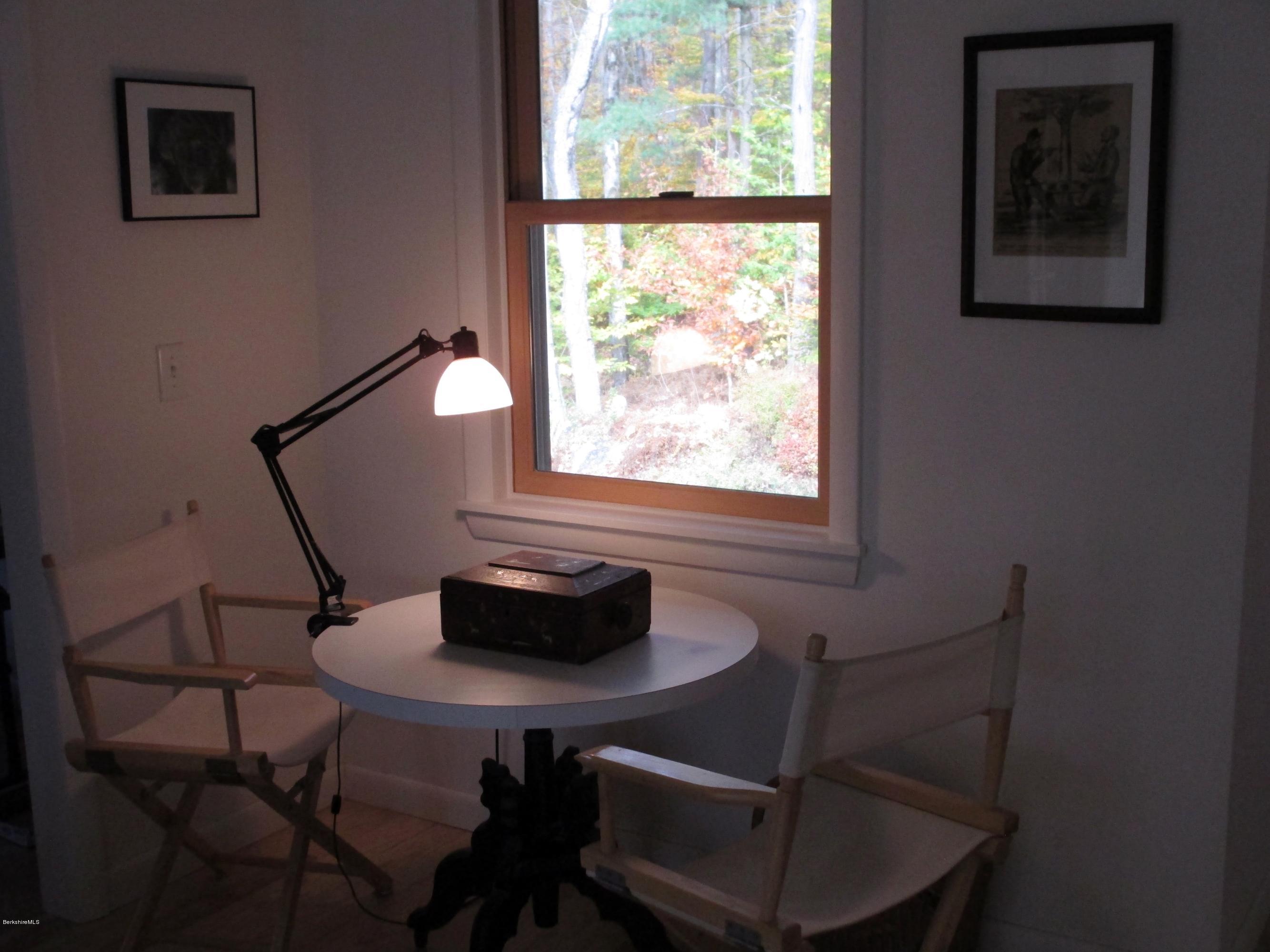170 Leland Road Becket, MA 01223 - Photo 26 of 59 a dining room with furniture and a window