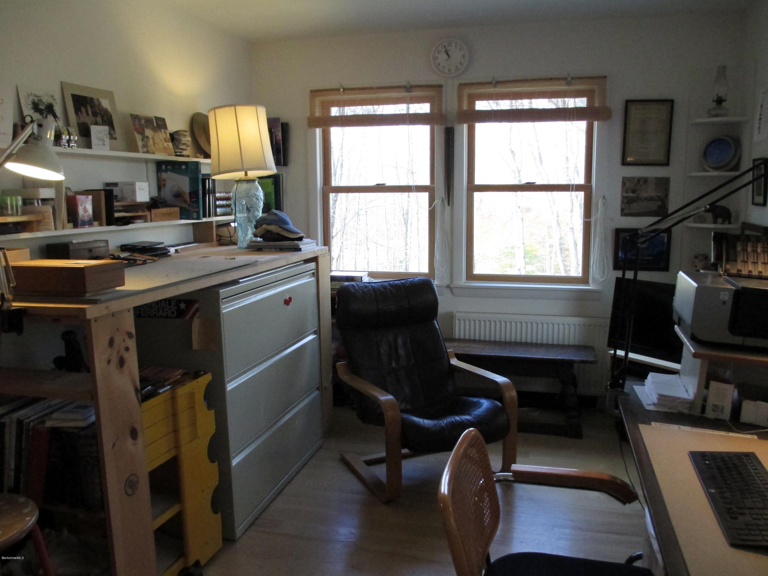 170 Leland Road Becket, MA 01223 - Photo 27 of 59 a view of a workspace with furniture and a window