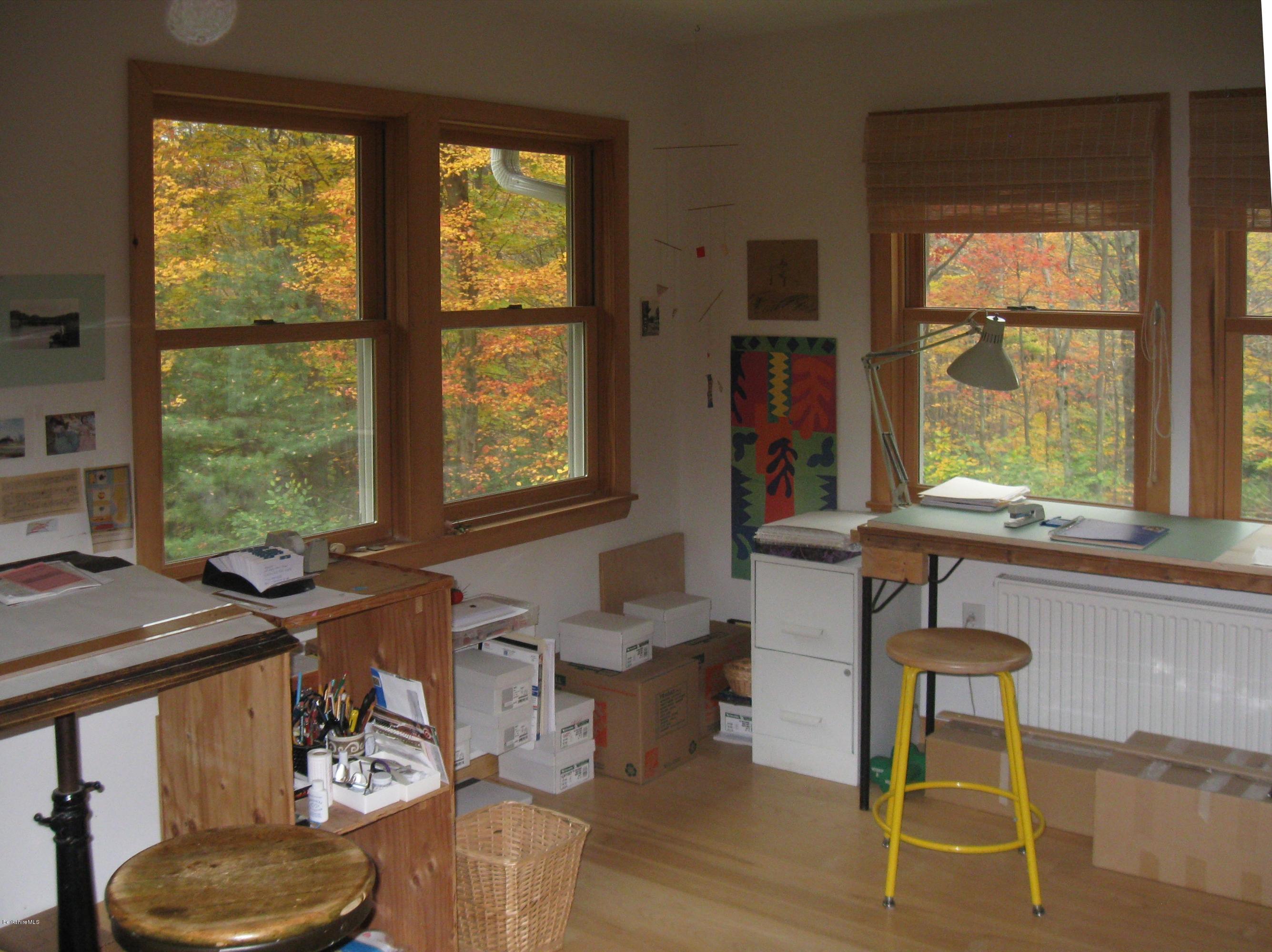 170 Leland Road Becket, MA 01223 - Photo 28 of 59 a living room with furniture and a window