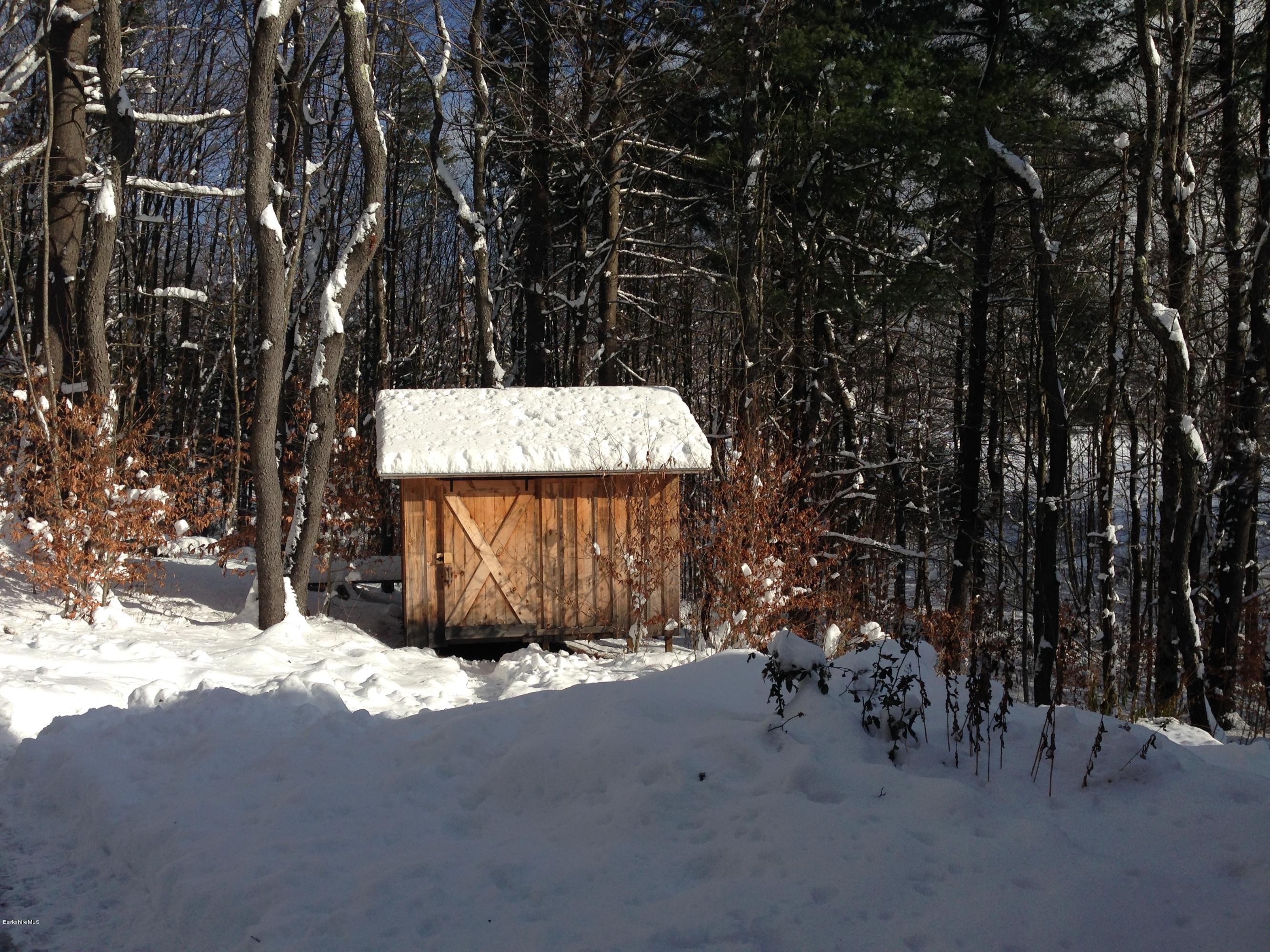 170 Leland Road Becket, MA 01223 - Photo 4 of 59 a view of a bench under a tree