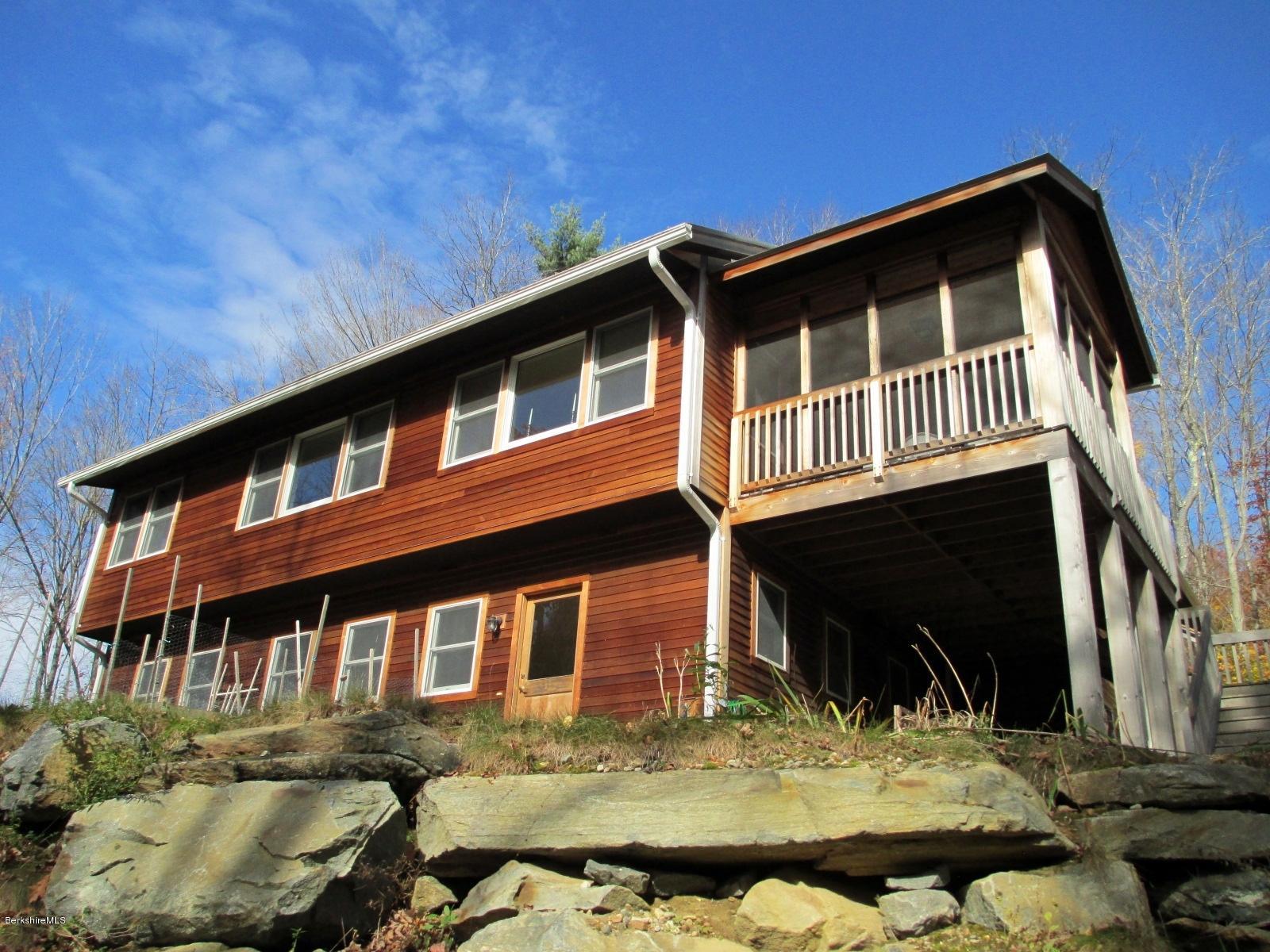 170 Leland Road Becket, MA 01223 - Photo 43 of 59 a front view of a house with swimming pool