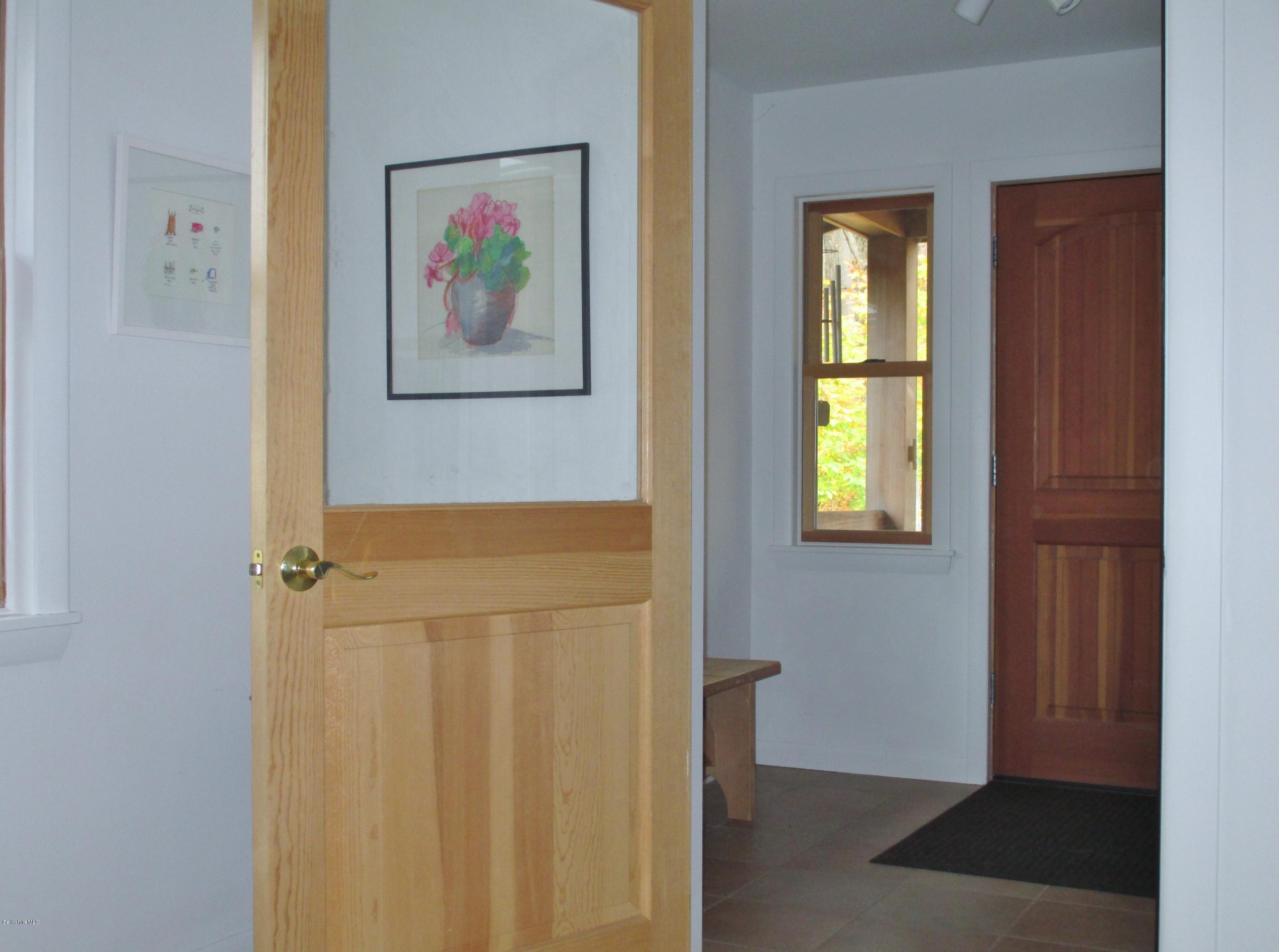 170 Leland Road Becket, MA 01223 - Photo 6 of 59 a view of a bathroom with a painting on the wall