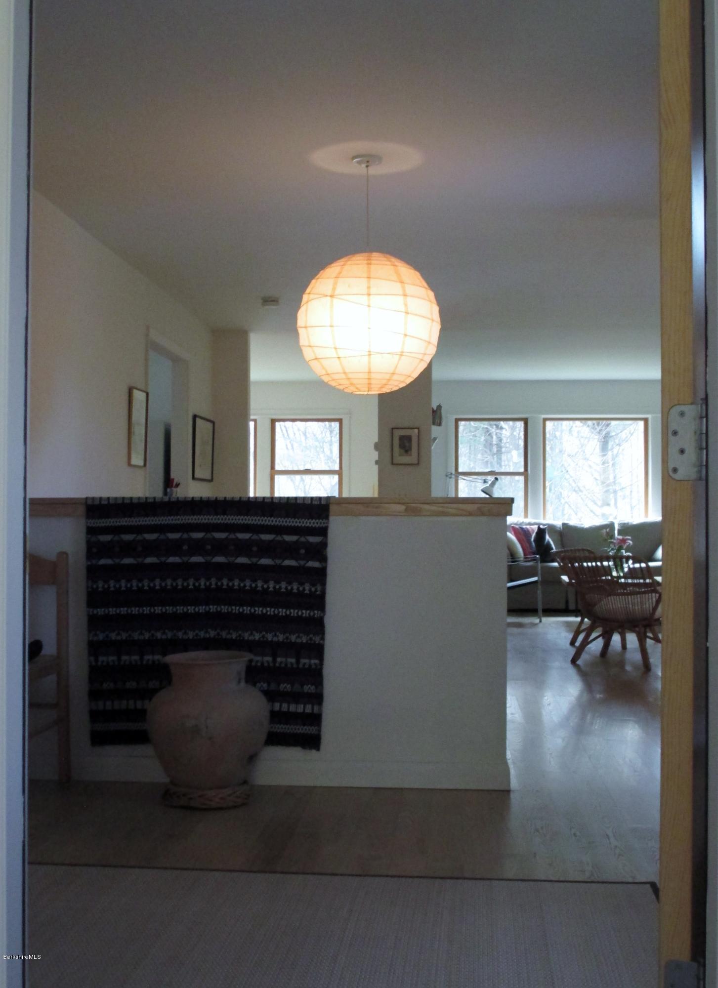 170 Leland Road Becket, MA 01223 - Photo 7 of 59 a living room with furniture and a fireplace