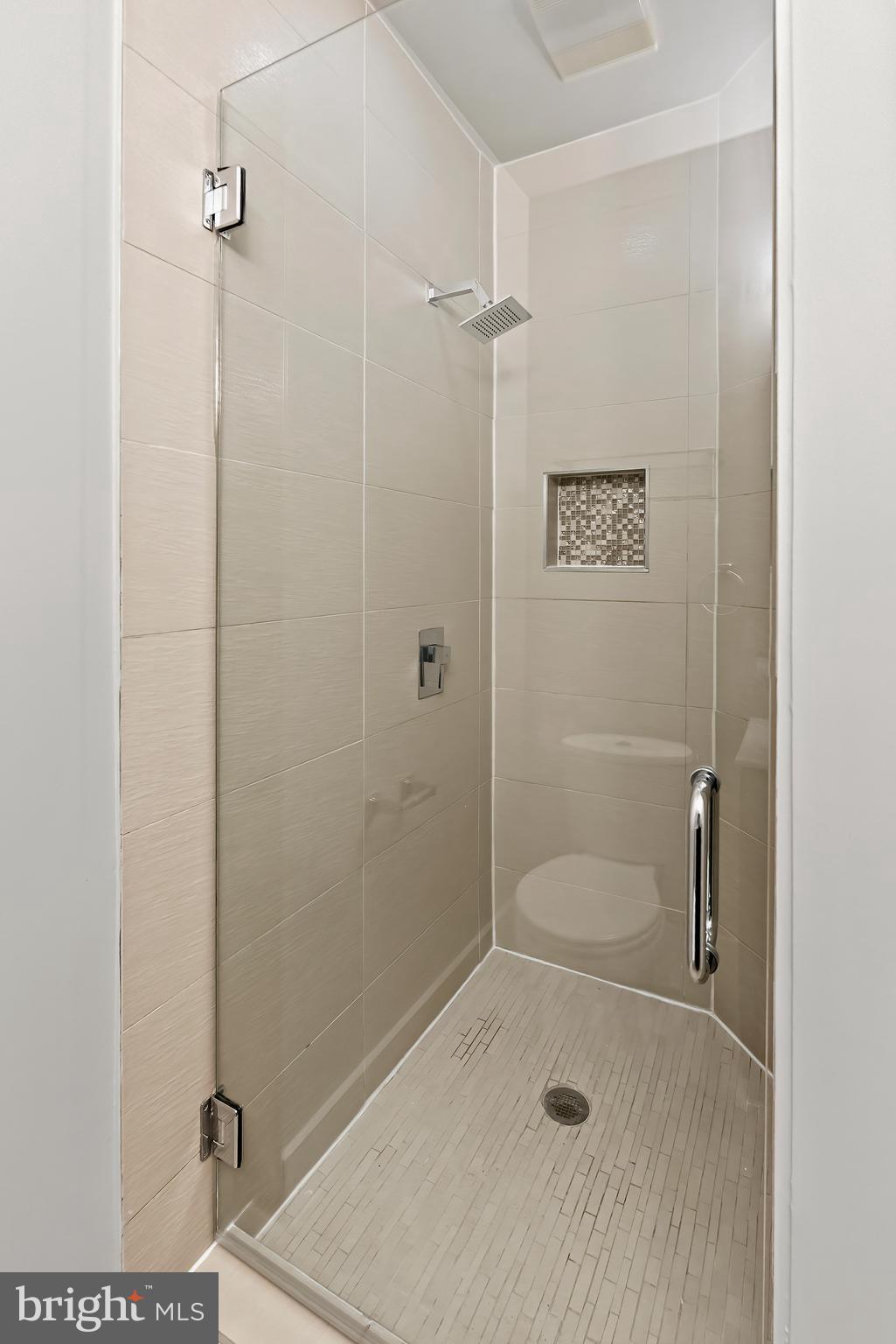 2616 Garfield Street Northwest, Unit 1 Washington, DC 20008 - Photo 13 of 22 a bathroom with a shower