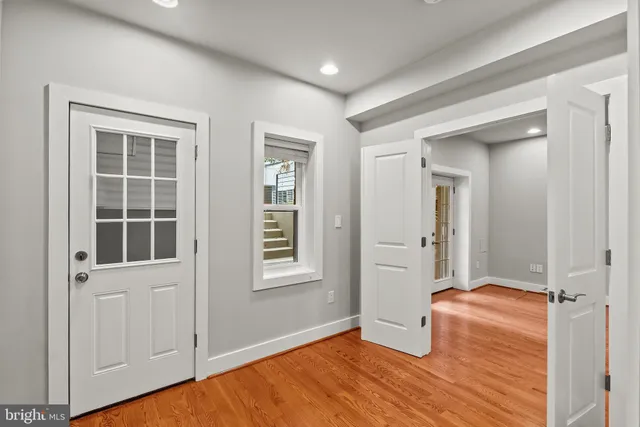 a view of a room with racks on the wall