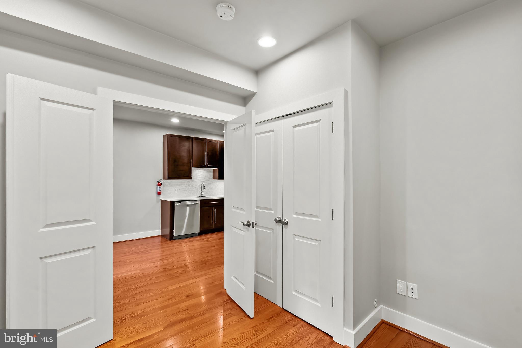 2616 Garfield Street Northwest, Unit 1 Washington, DC 20008 - Photo 16 of 22 a view of a livingroom with a flat screen tv